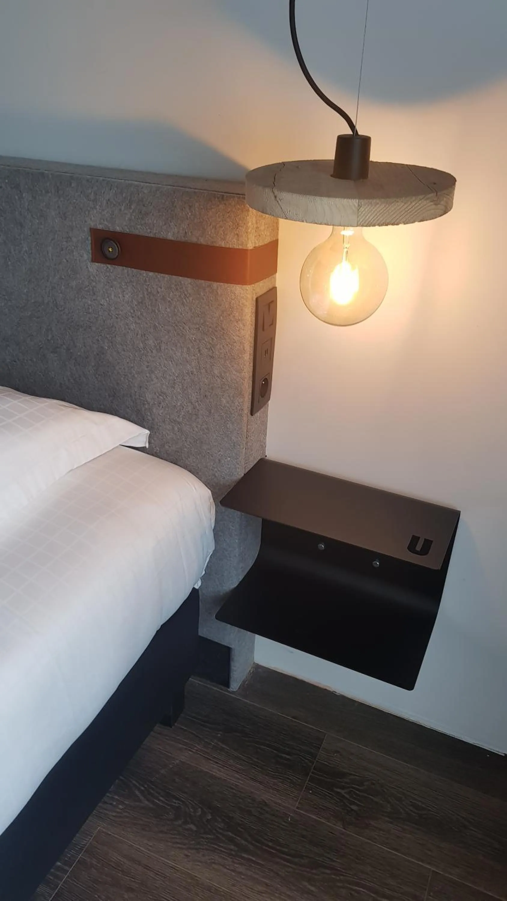 Bed in Upstairs Hotel