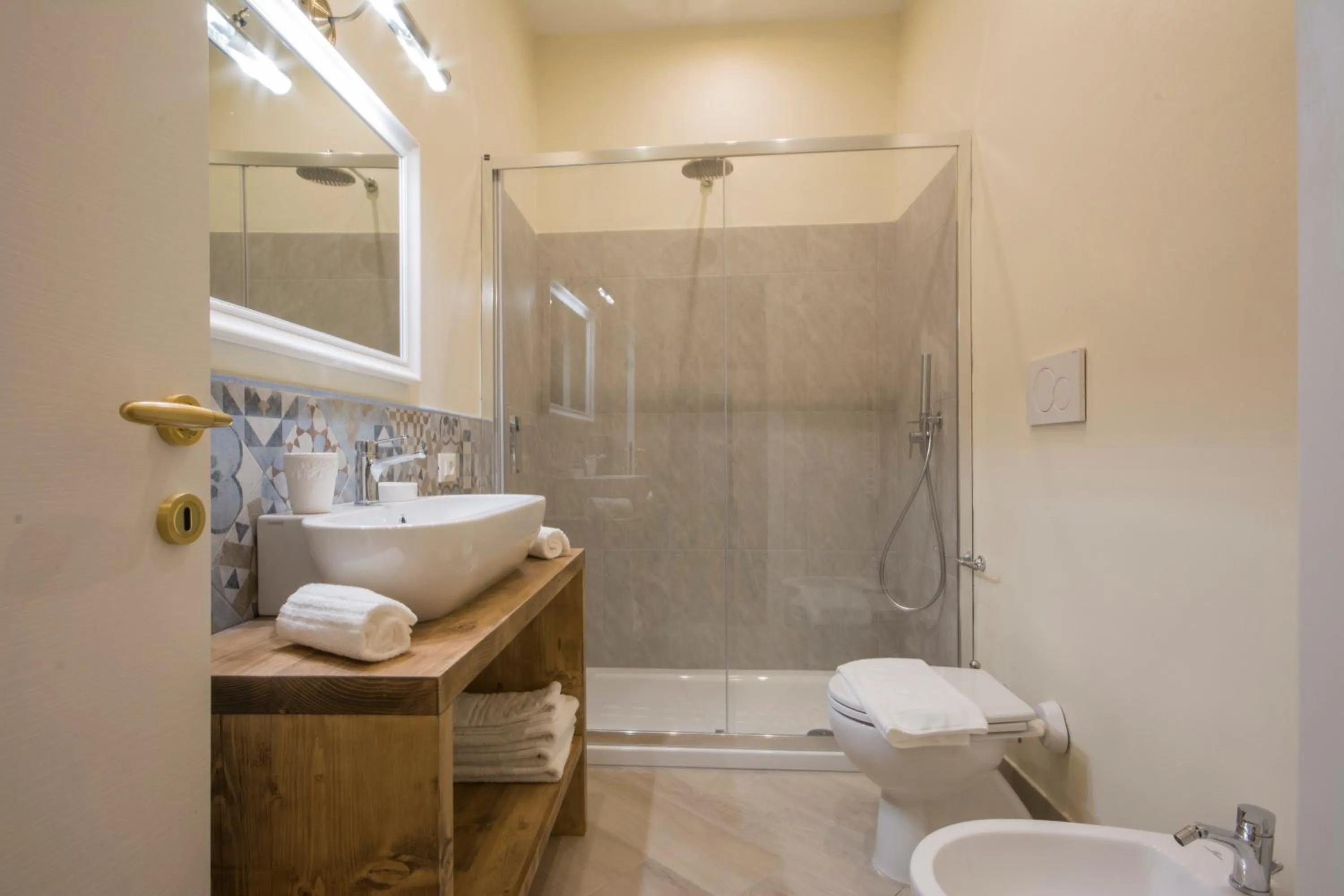 Shower in Iris Apartments by Mmega