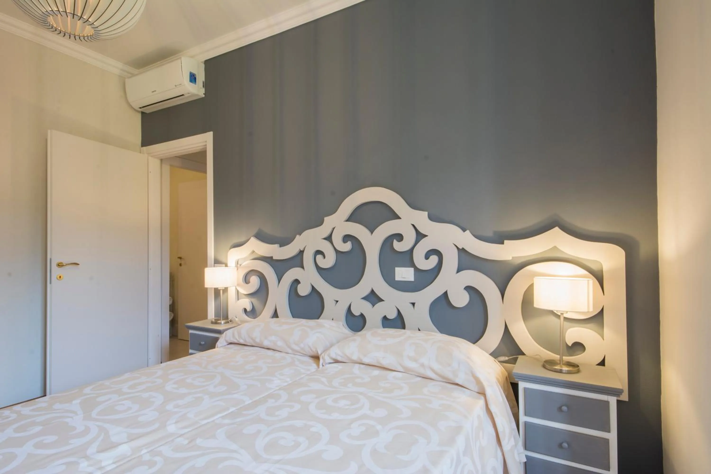 Bedroom, Bed in Iris Apartments by Mmega