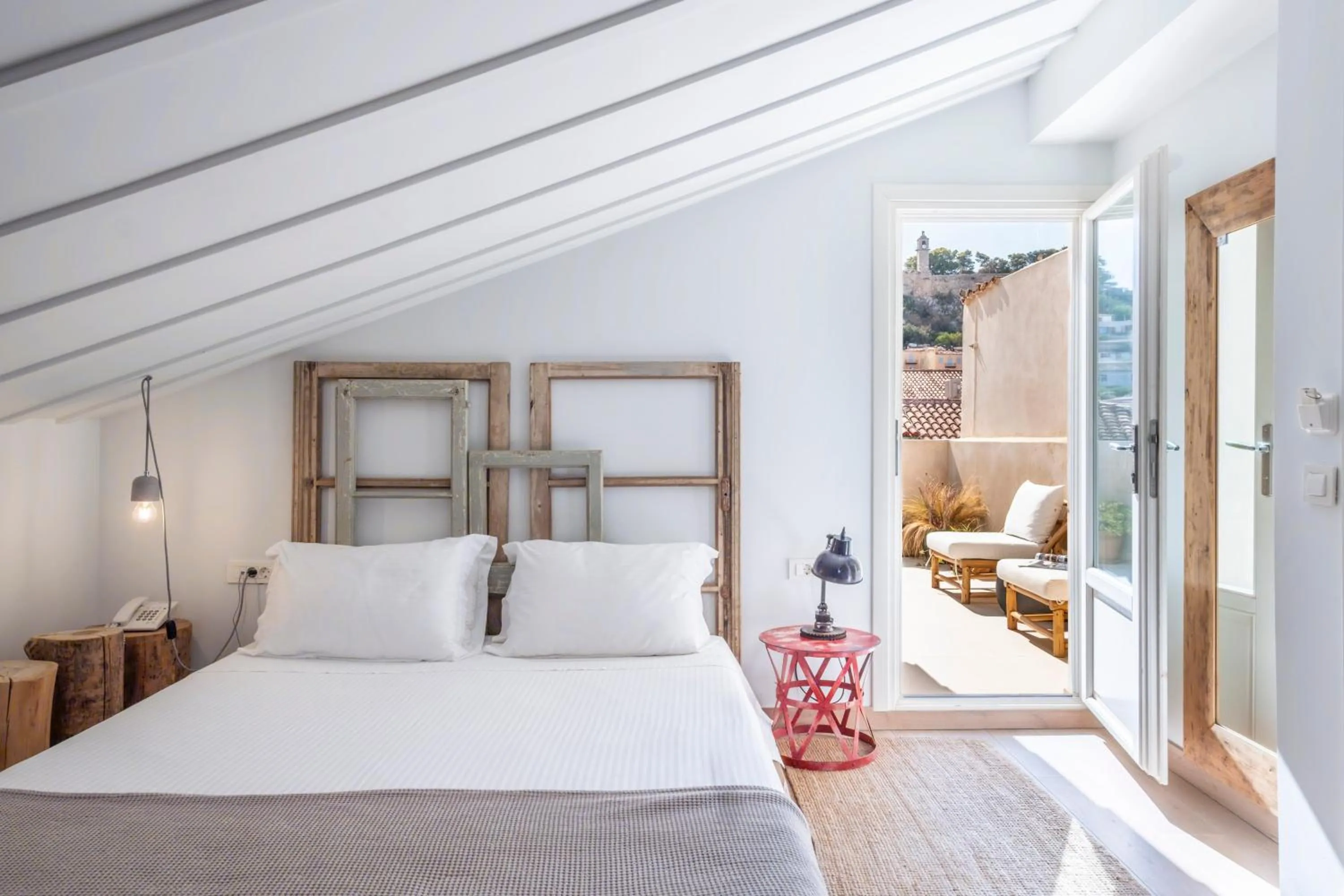 Bed in Amymone Suites