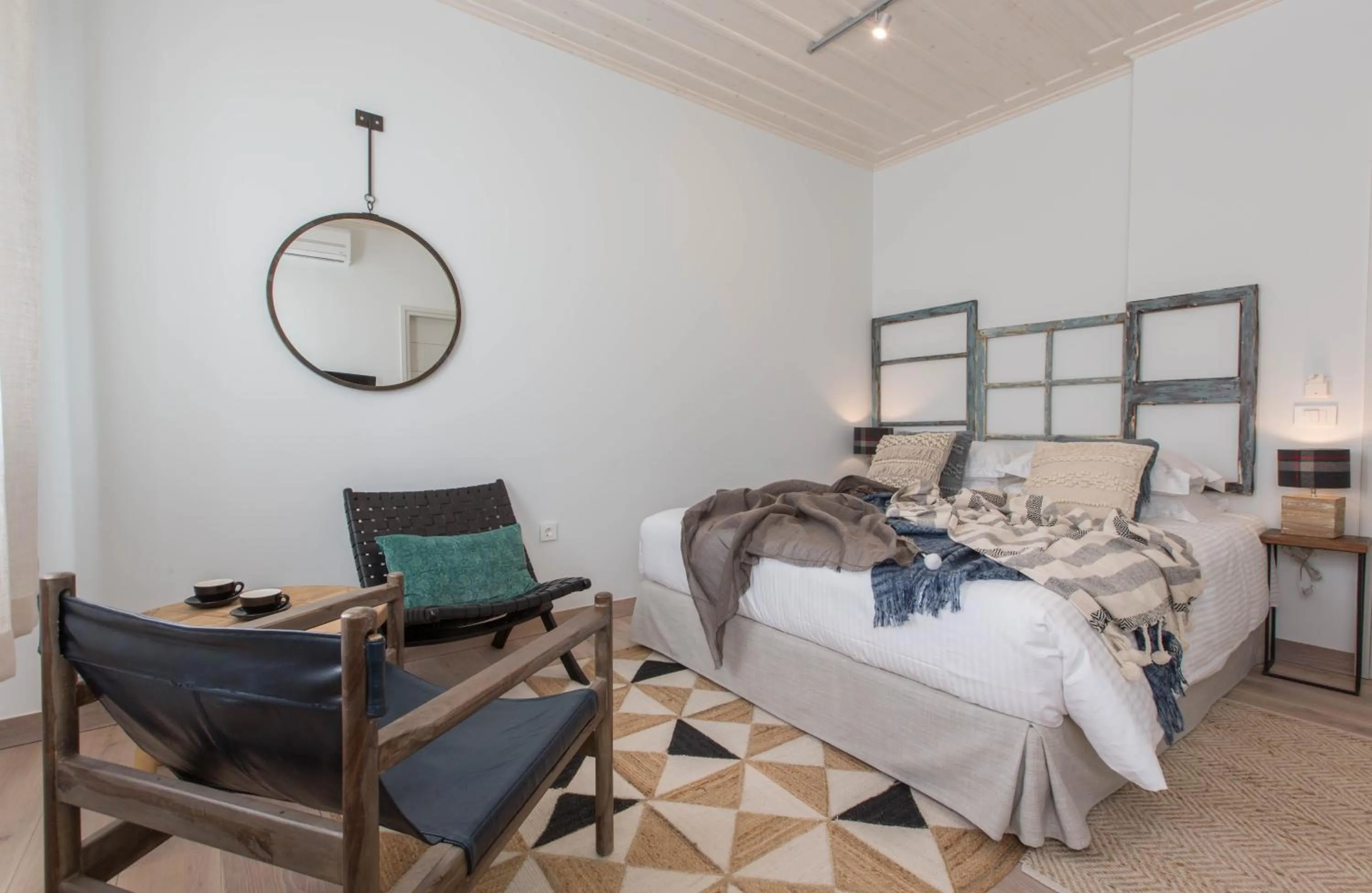 Bed in Amymone Suites