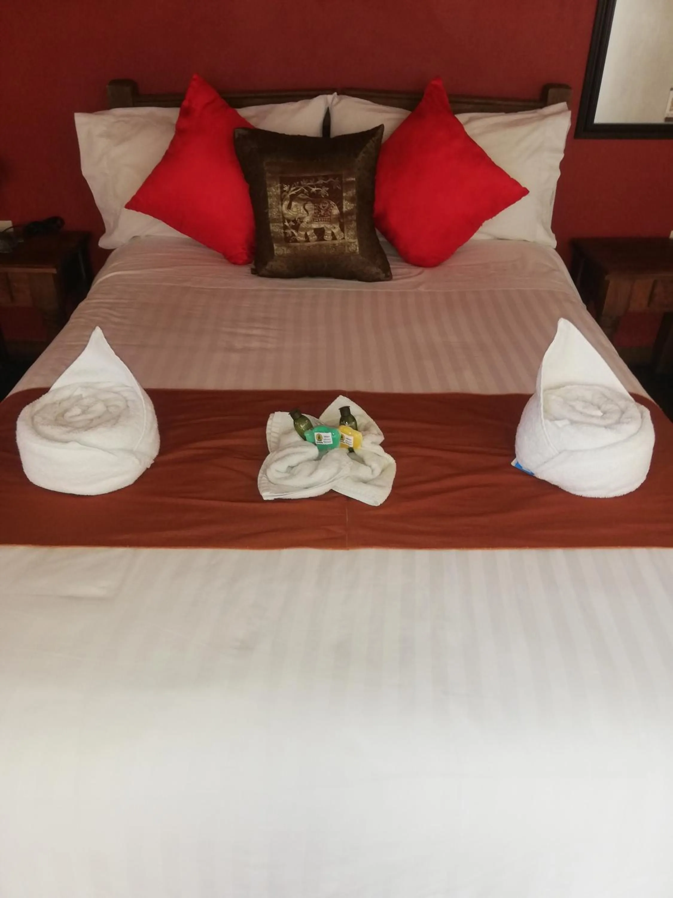 Bed in Ganesha Hotel