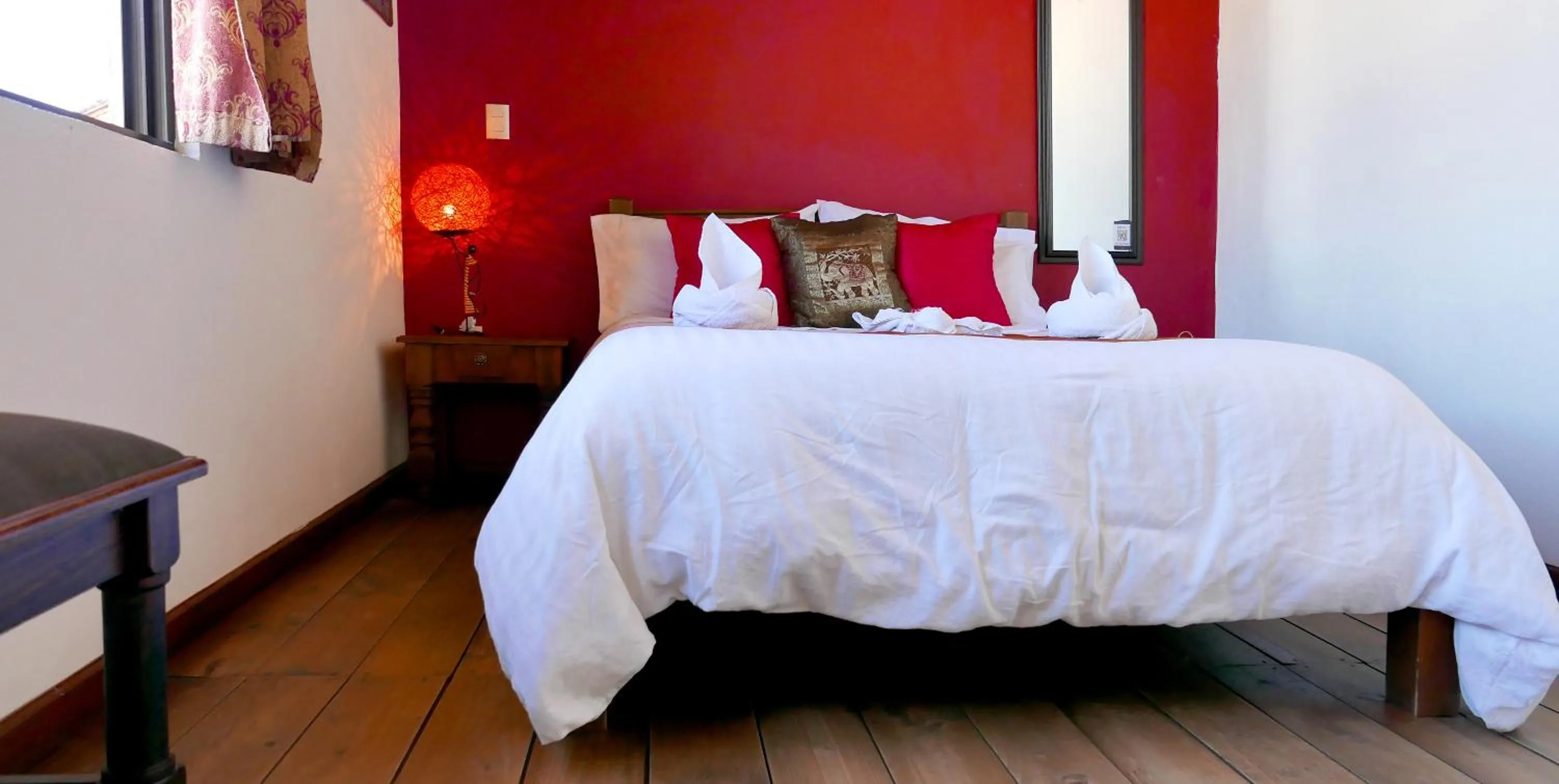 Bed in Ganesha Hotel