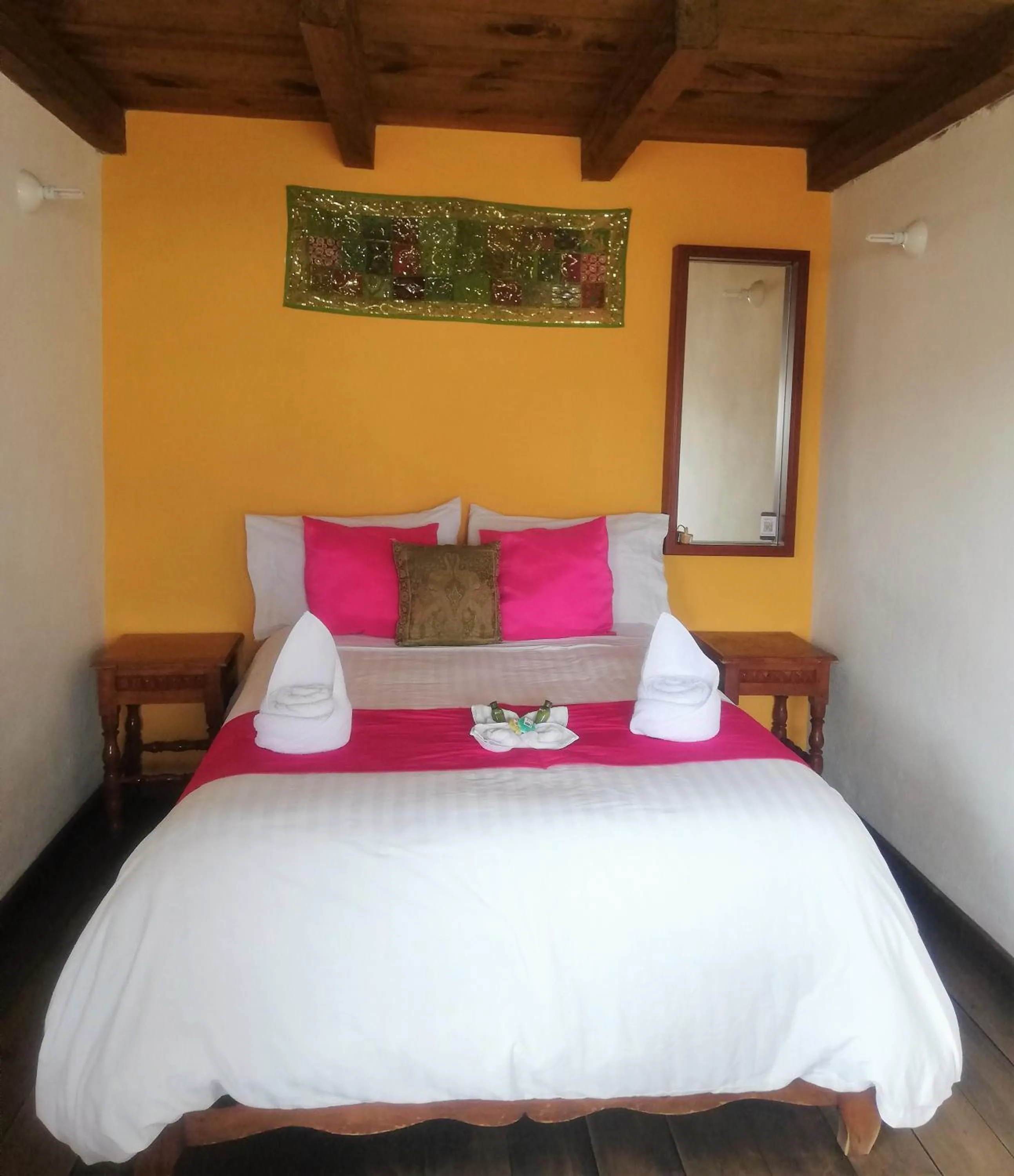 Bed in Ganesha Hotel