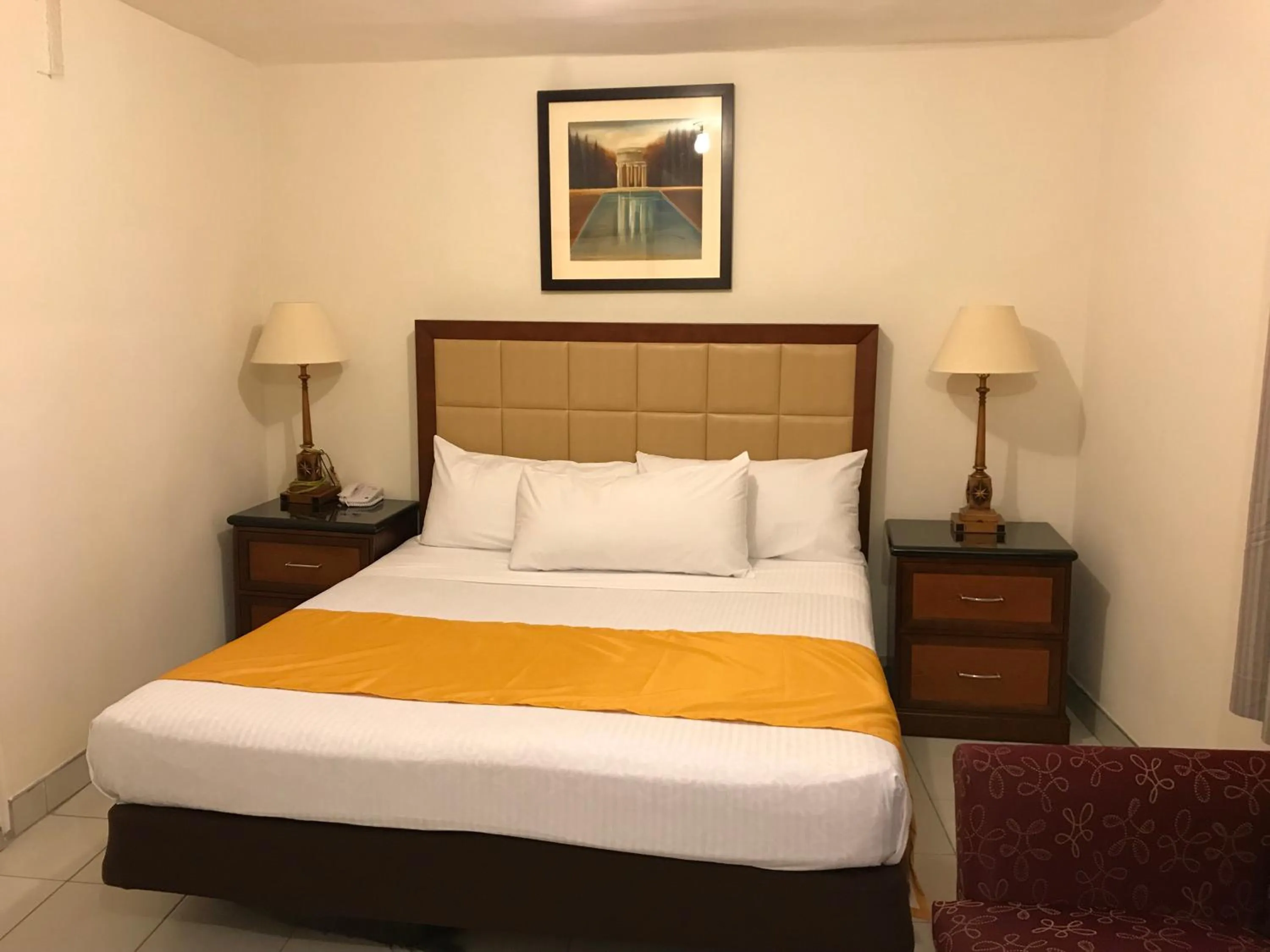 Bed in Hotel Guillen Jr