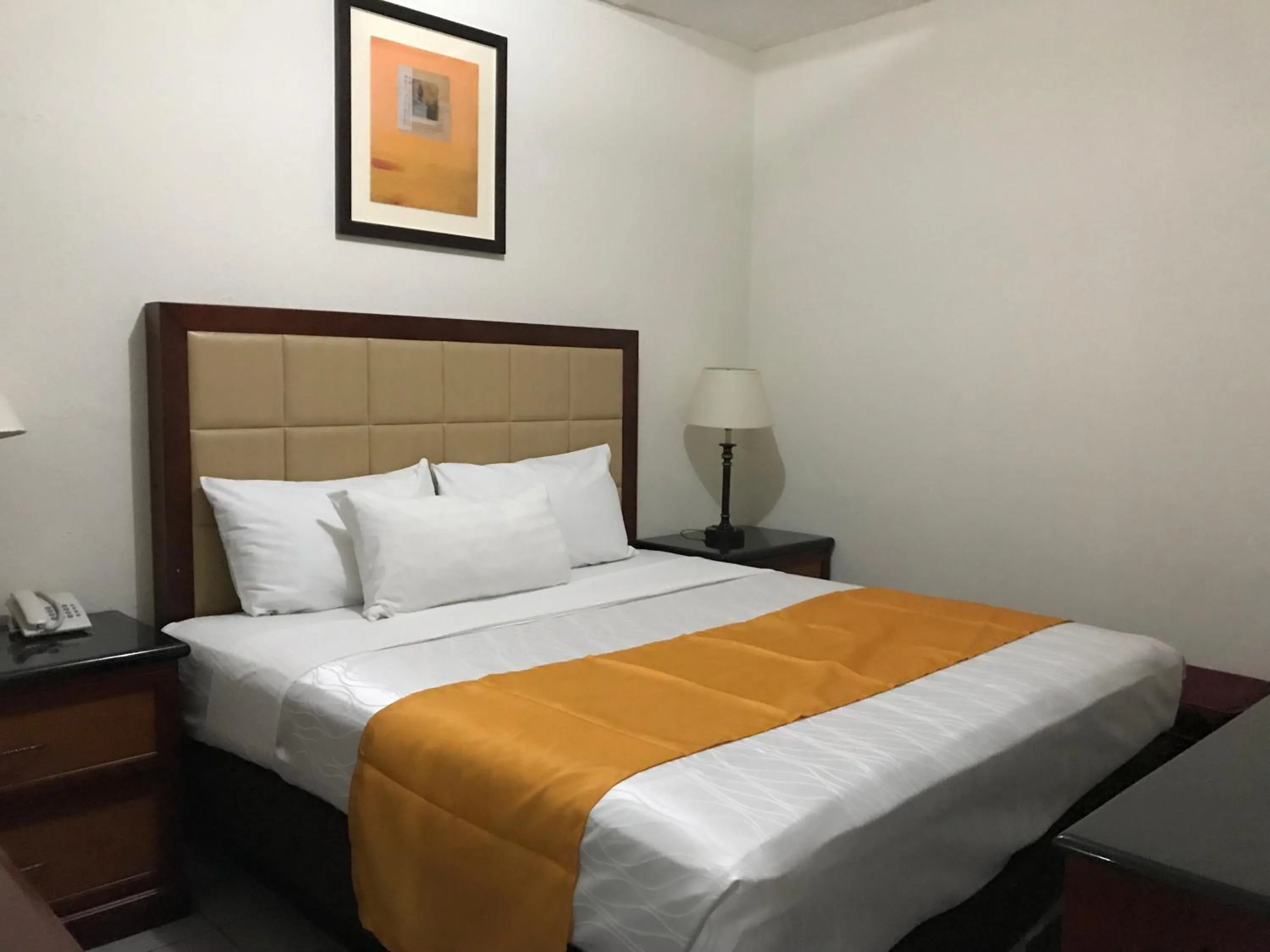 Bed in Hotel Guillen Jr