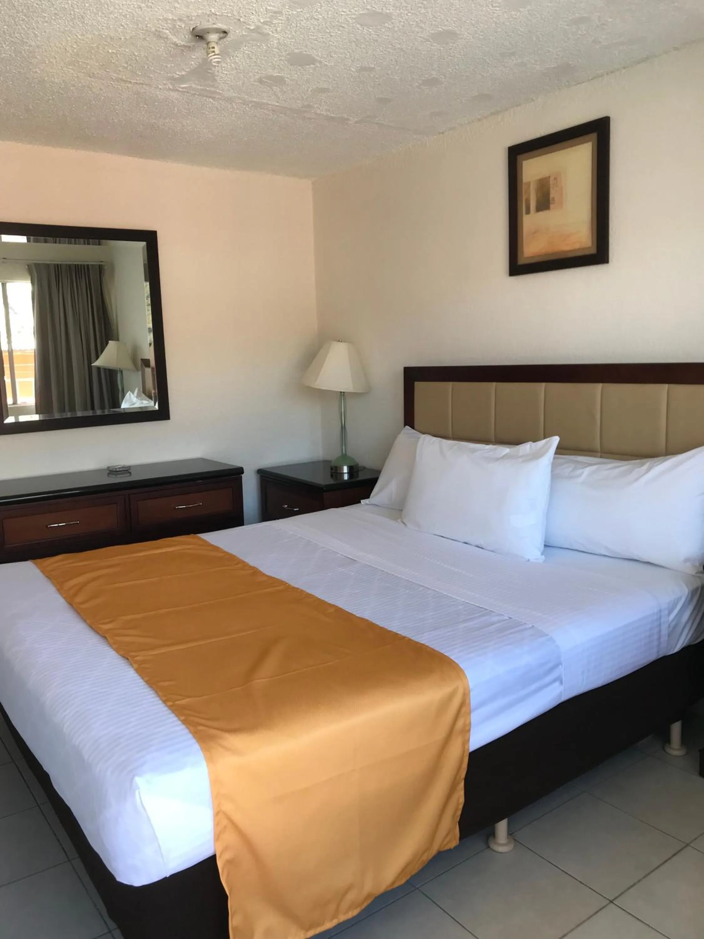 Bed in Hotel Guillen Jr