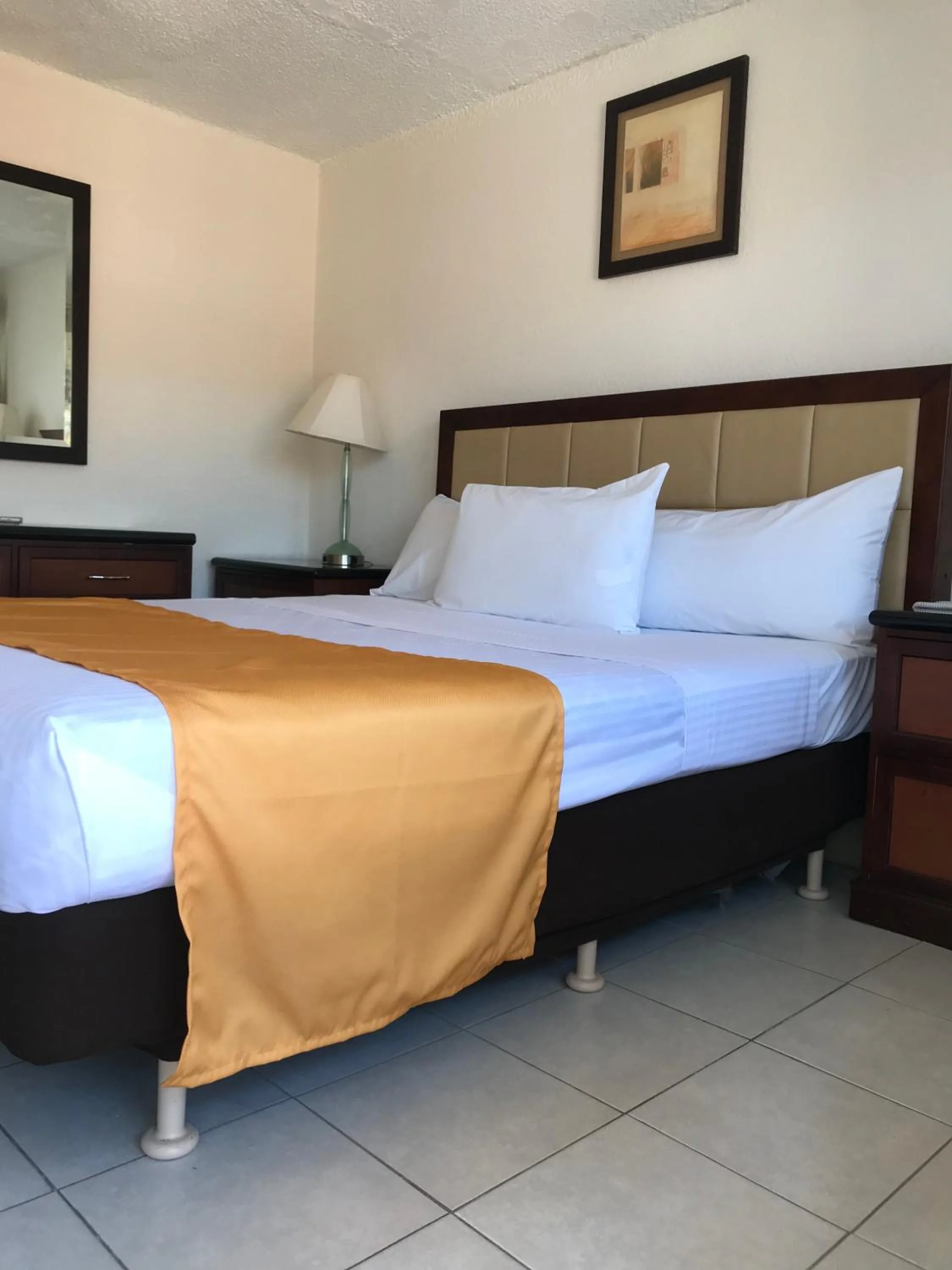 Bed in Hotel Guillen Jr