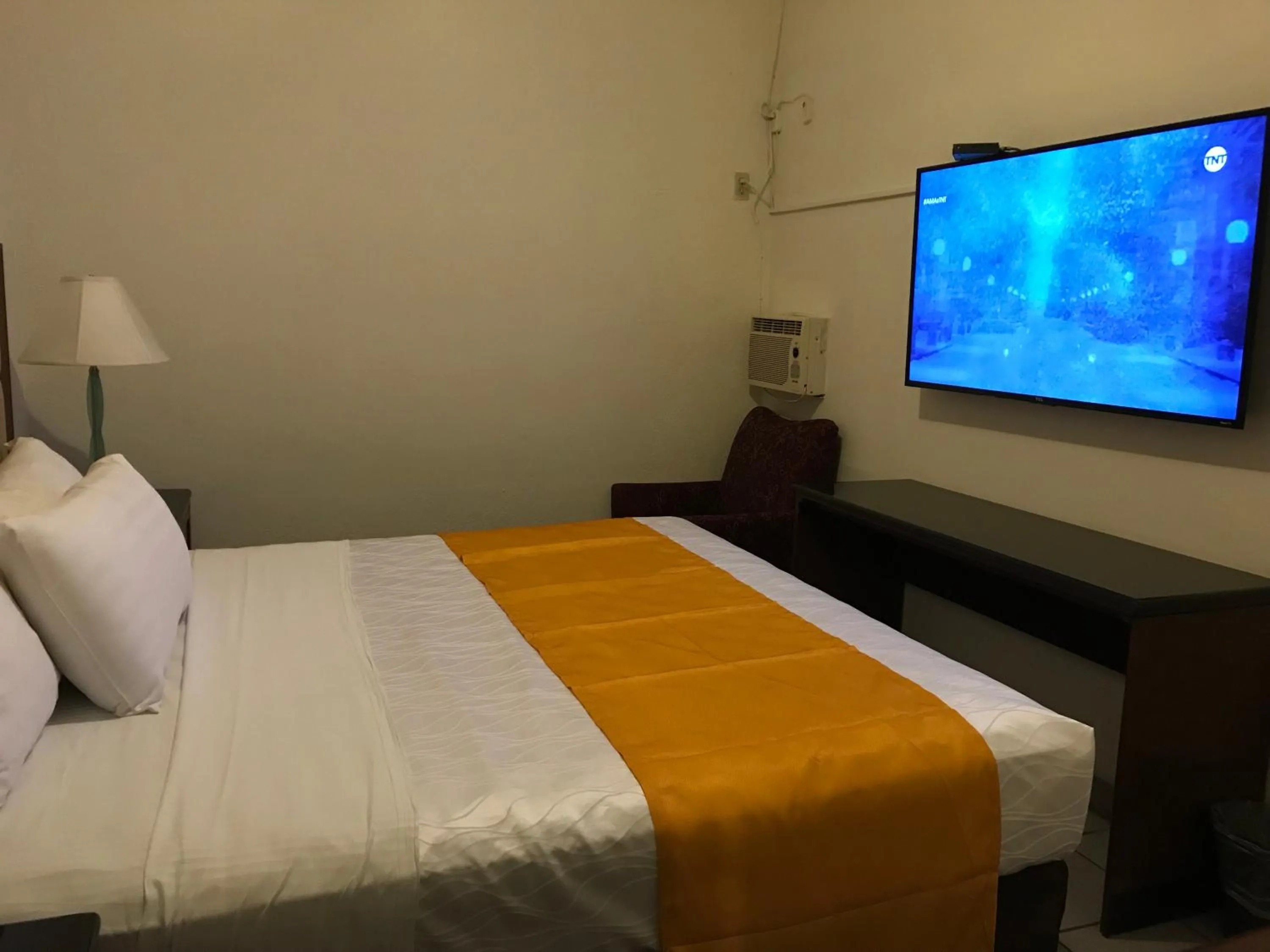 Bed in Hotel Guillen Jr