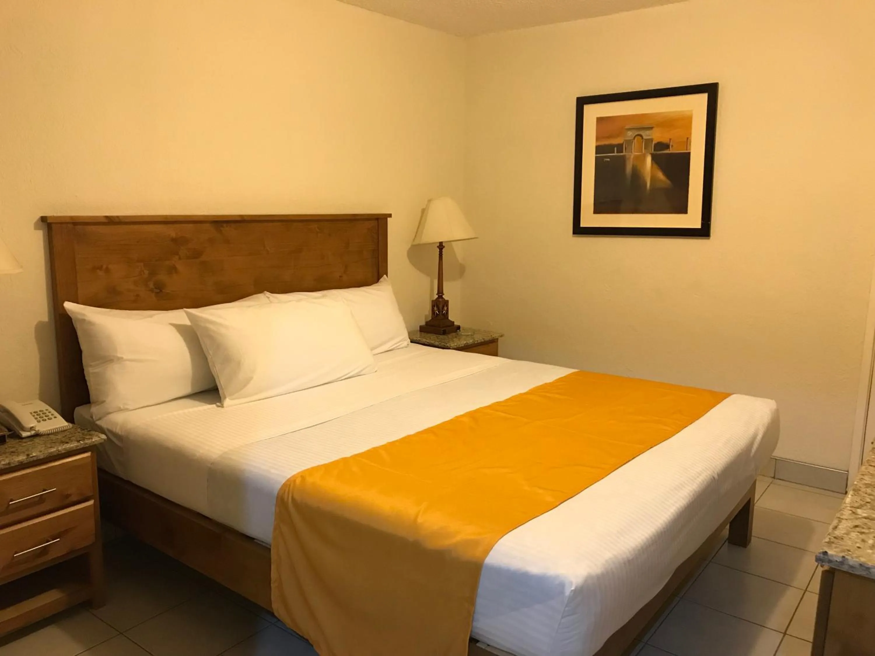 Bed in Hotel Guillen Jr