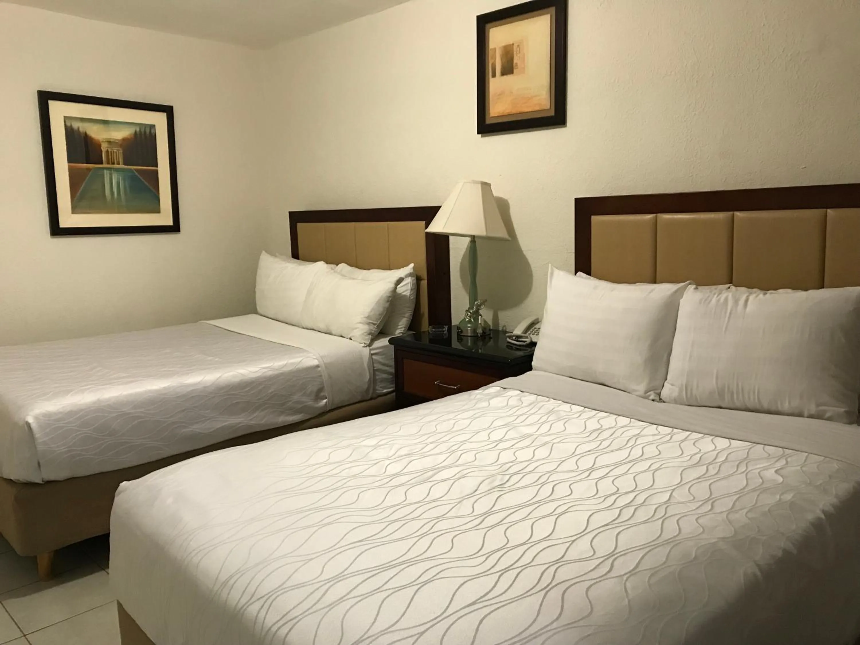 Bed in Hotel Guillen Jr