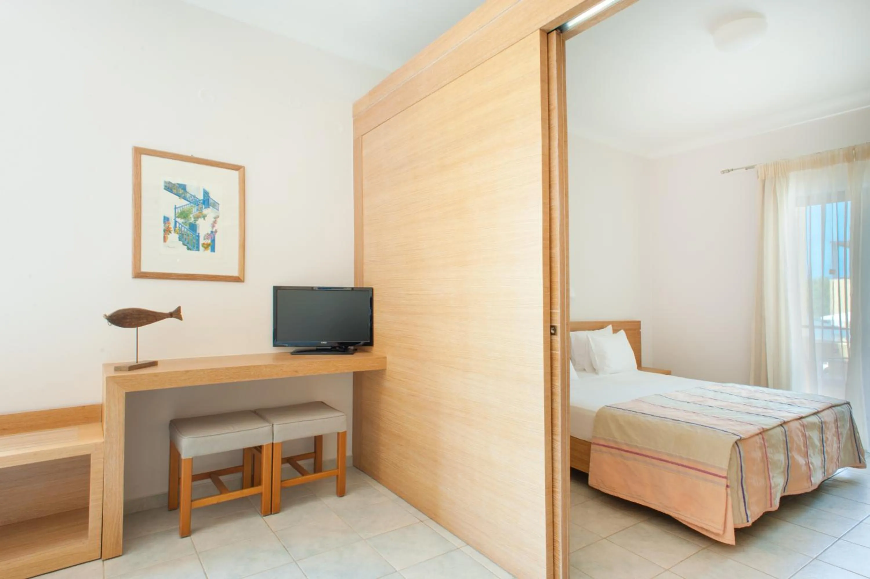 Bed in Silver Beach Hotel & Apartments