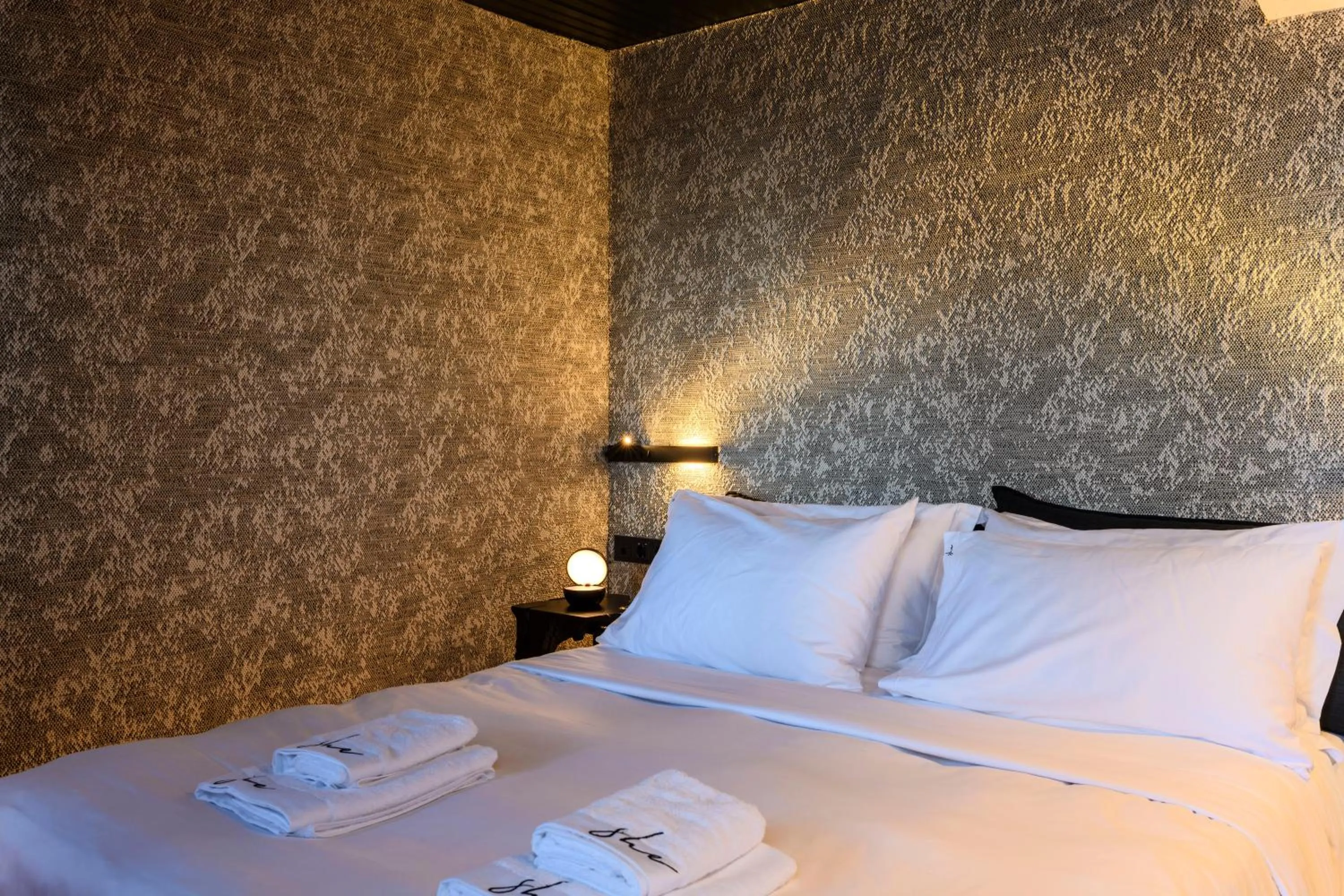 Bed in She Mykonos Boutique Hotel