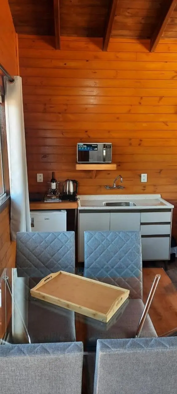 Kitchen or kitchenette in Pousada Recanto do Lago
