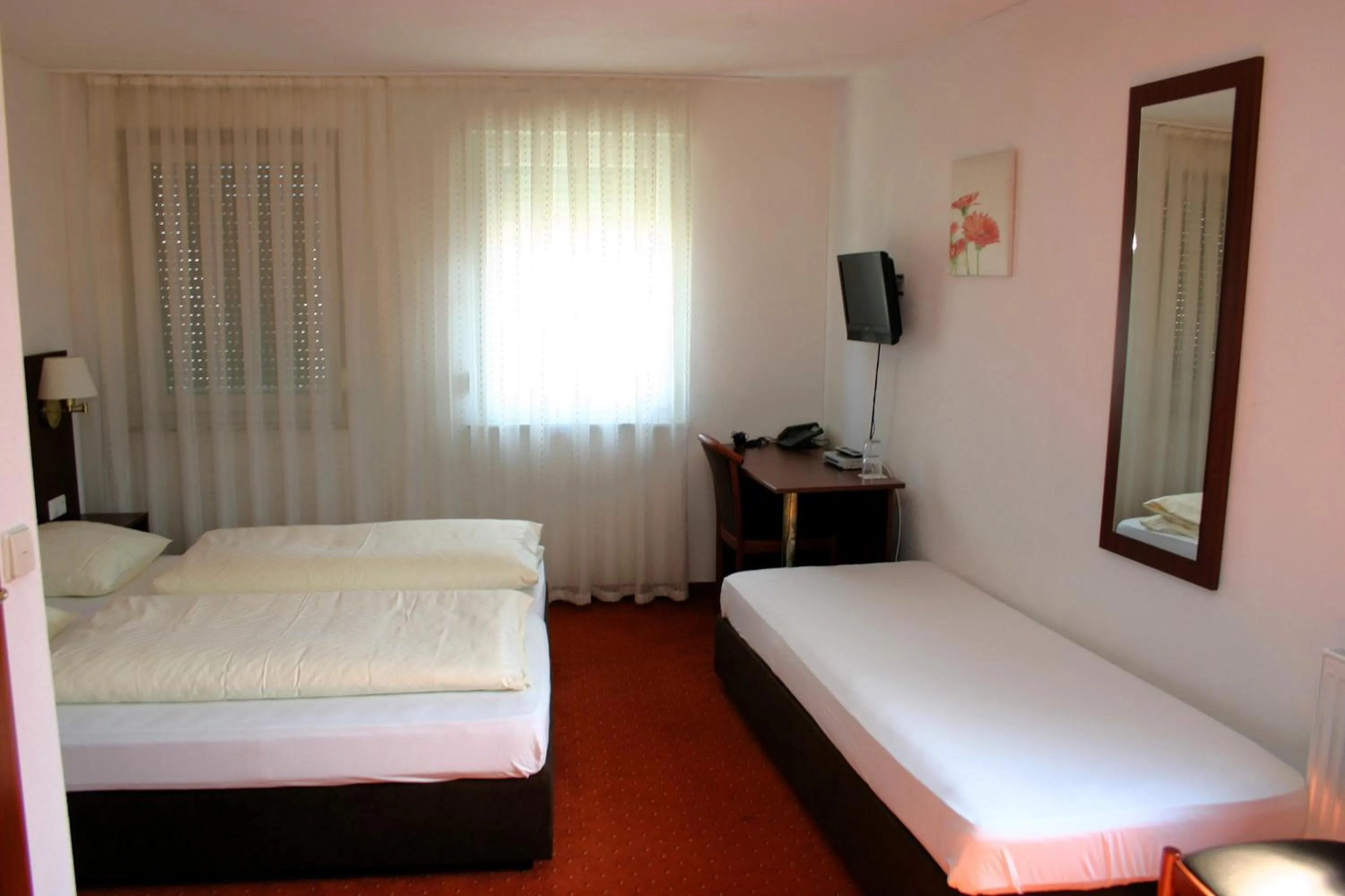Photo of the whole room, Bed in Gasthaus Traube