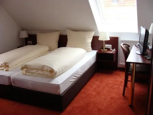 Photo of the whole room, Bed in Gasthaus Traube