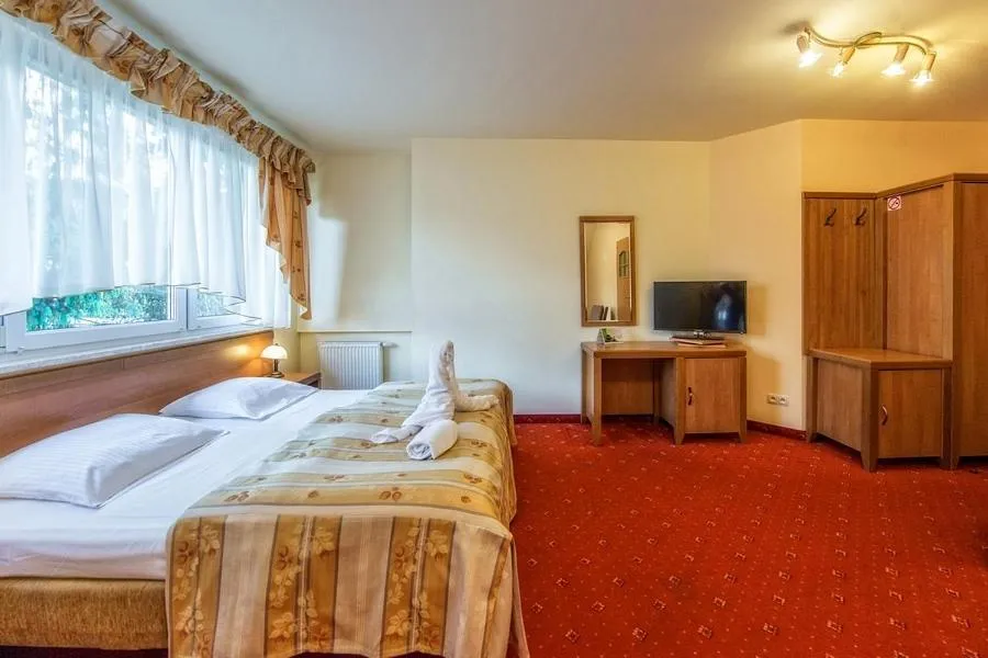 Bed in Hotel Pod Gołębiem