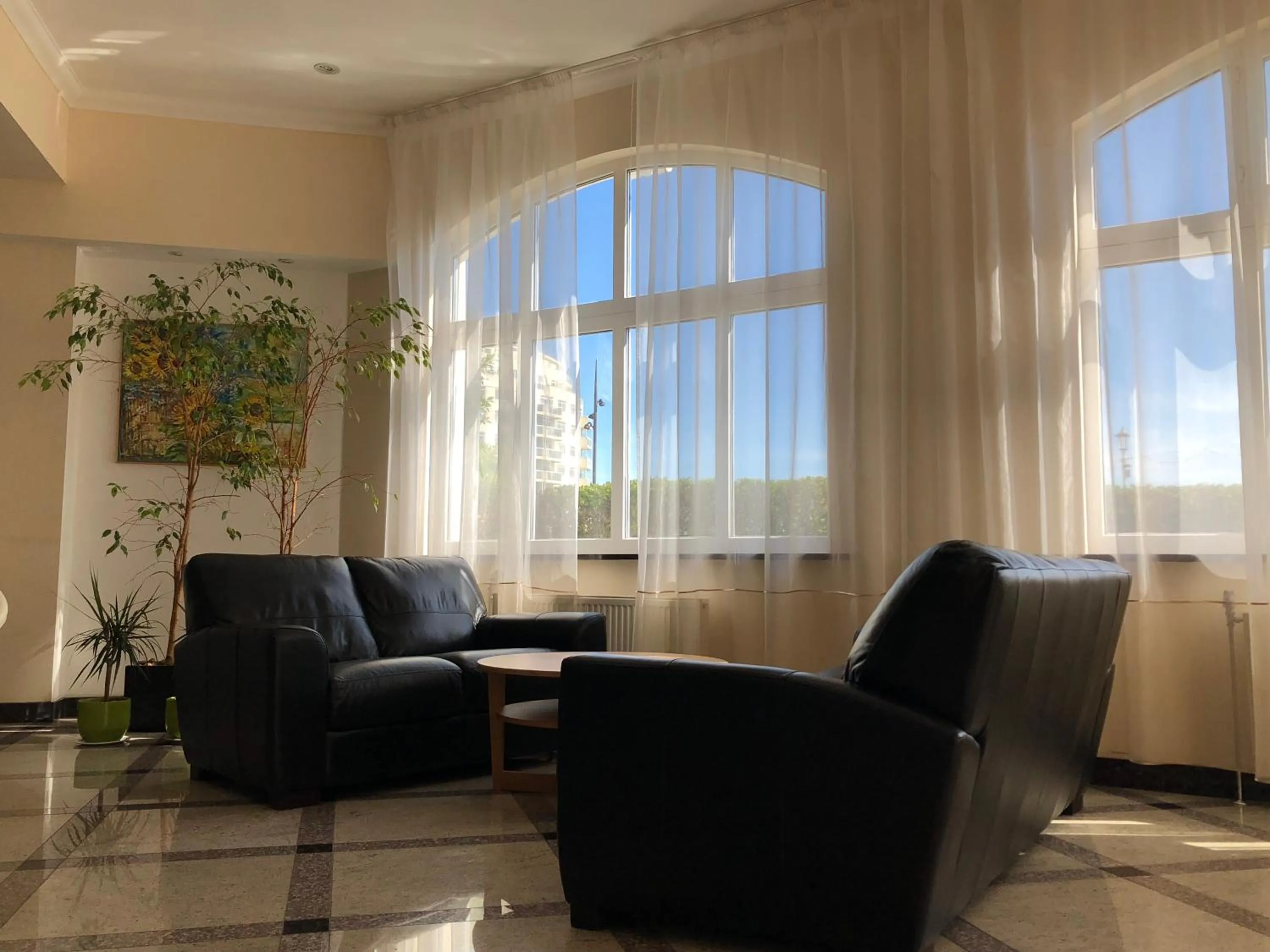 Communal lounge/ TV room in Eastbourne Riviera Hotel