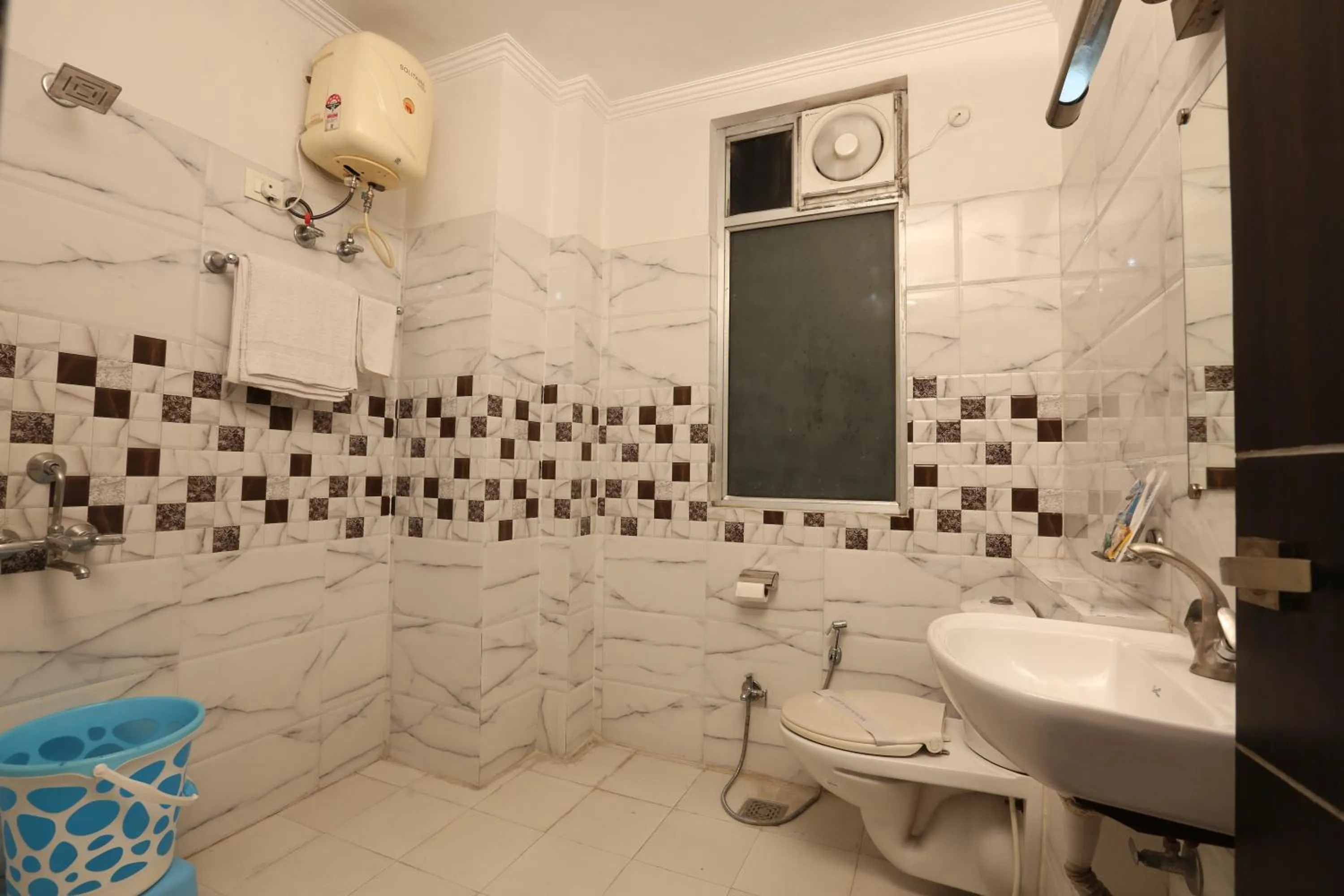 Shower in Hotel Nexus l Hotels In Charbagh Lucknow