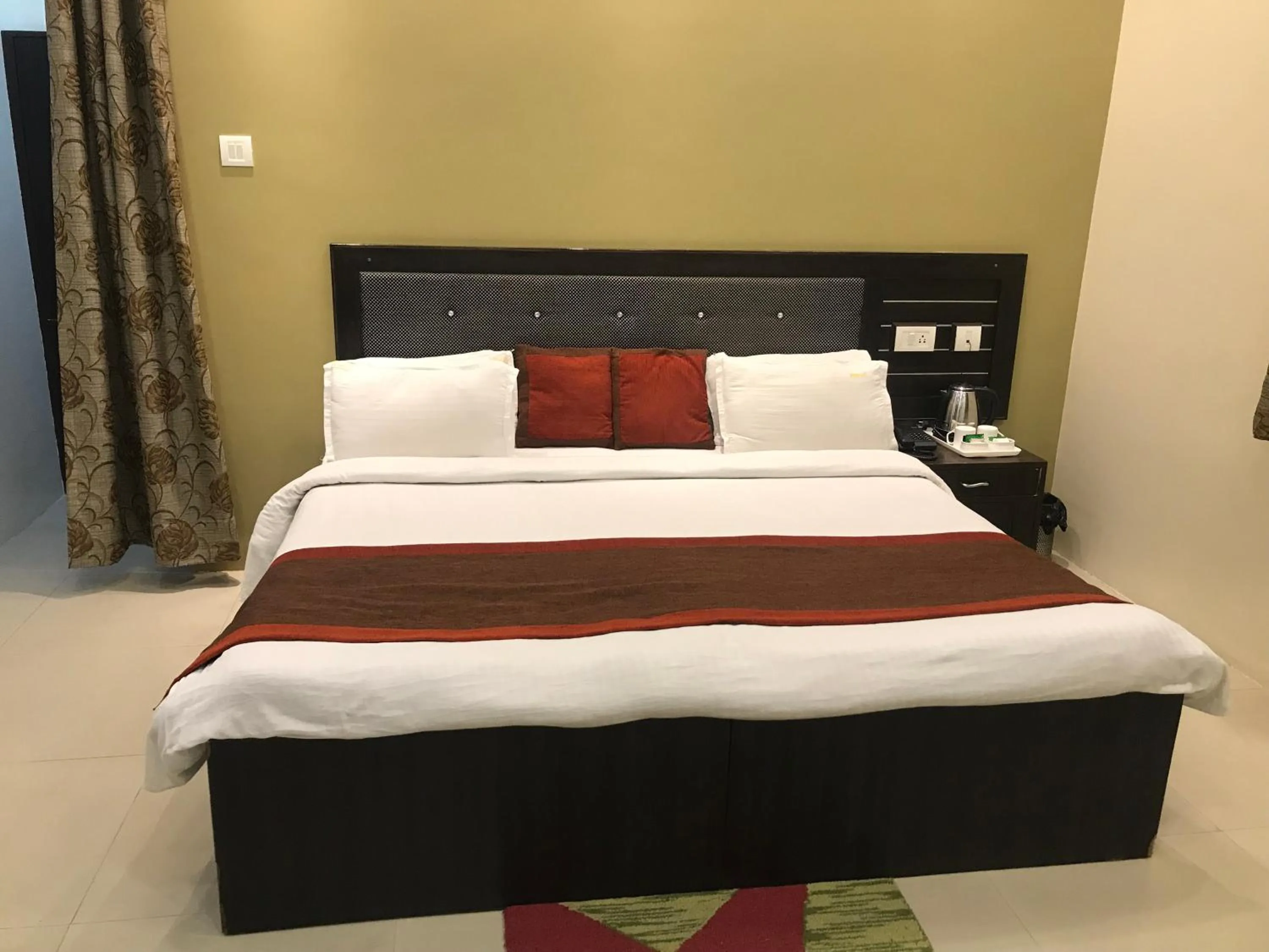 Bed in Hotel Nexus l Hotels In Charbagh Lucknow