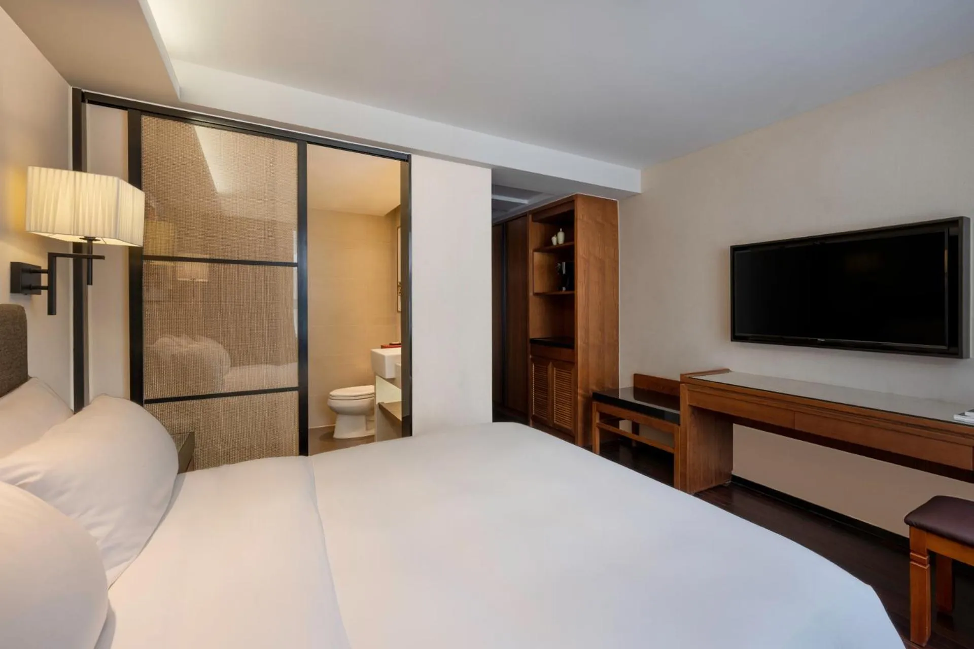 Bed in SSAW Boutique Hotel Sanya