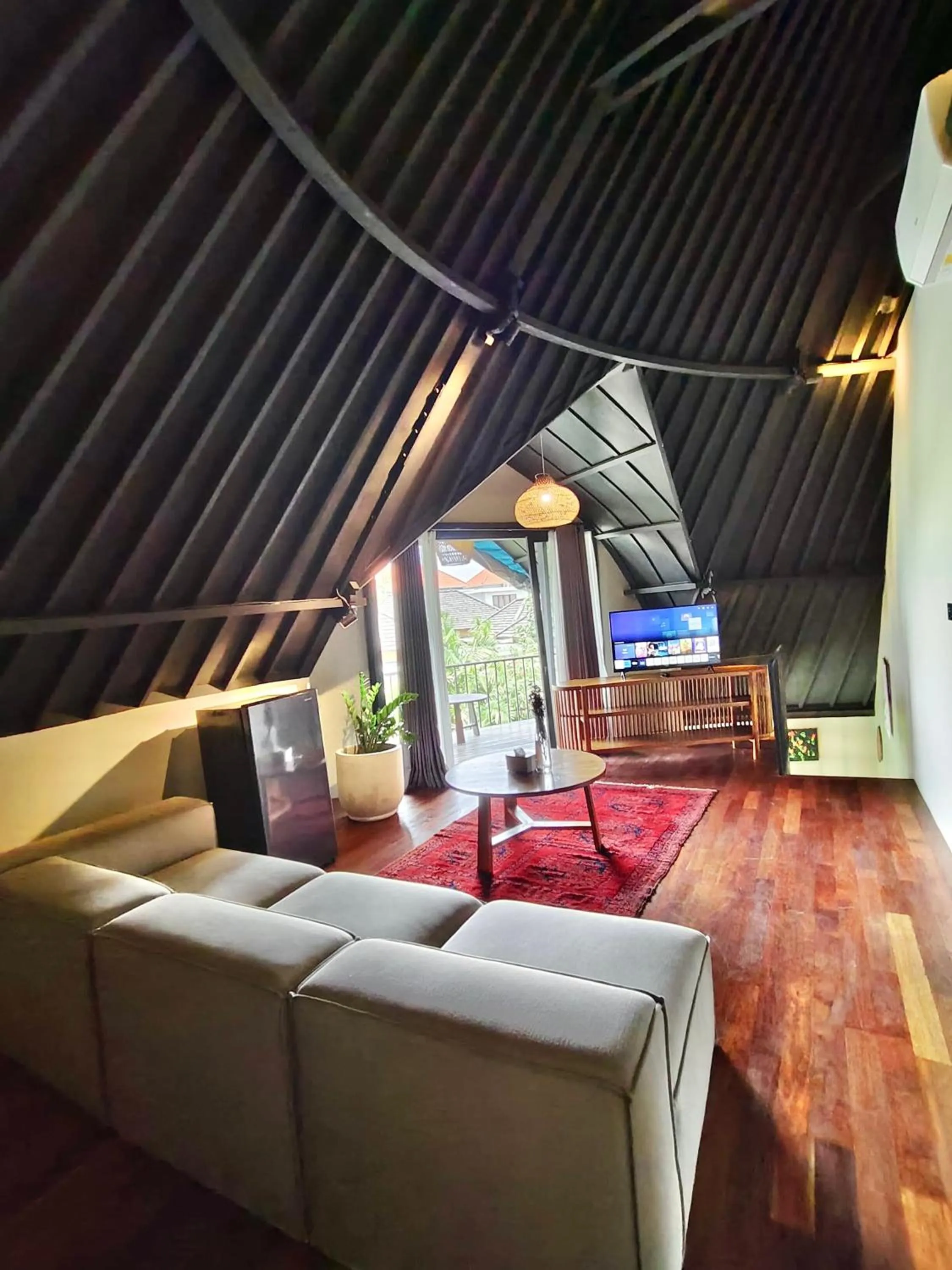 Communal lounge/ TV room in SuB Villas Bali