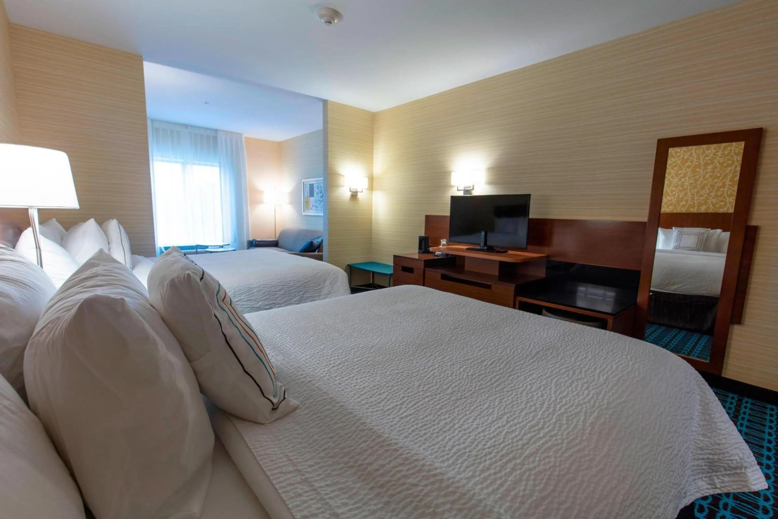 Photo of the whole room, Bed in Fairfield Inn & Suites by Marriott Atlanta Woodstock