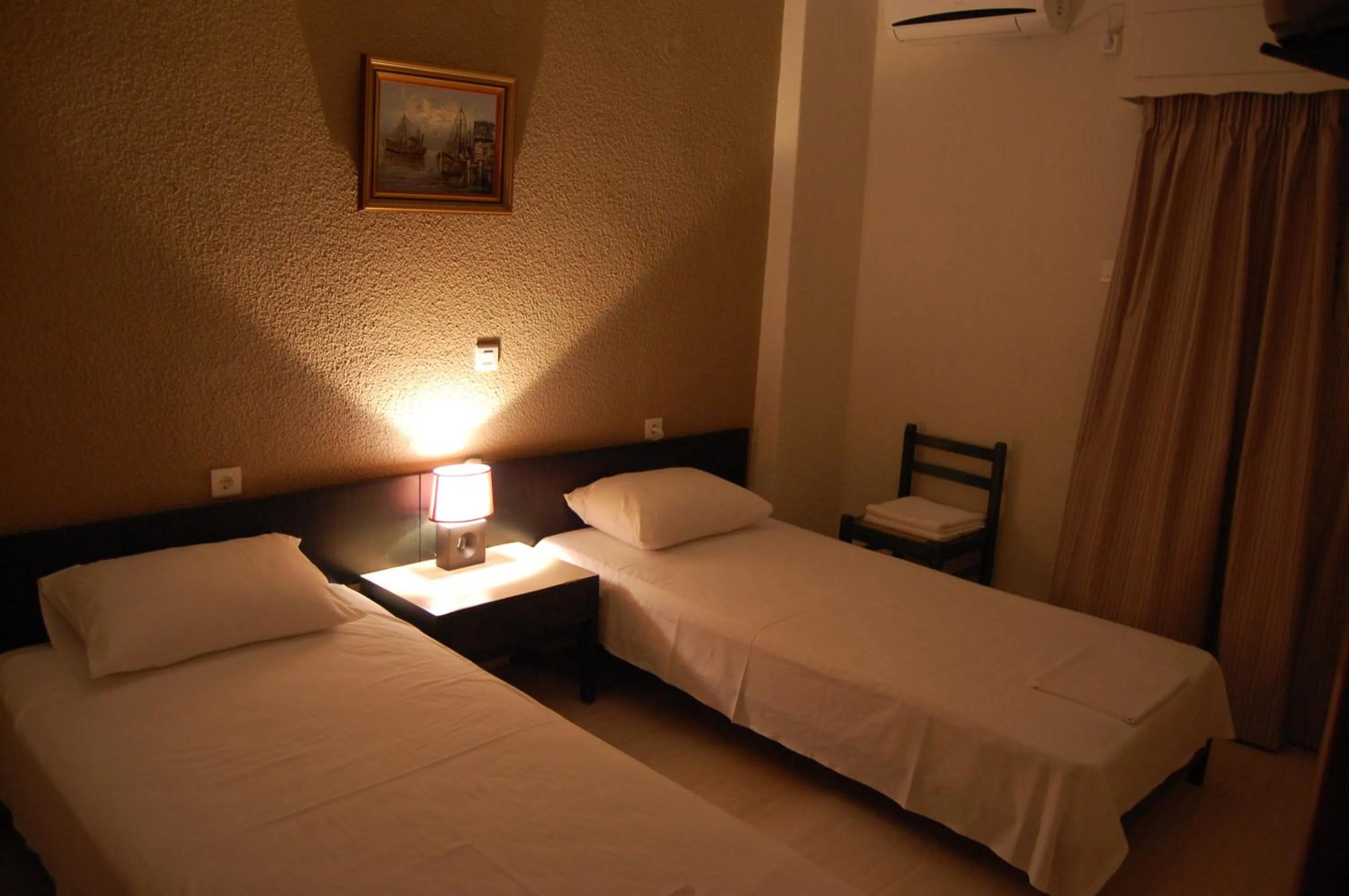 Photo of the whole room, Bed in Hotel Antirriο