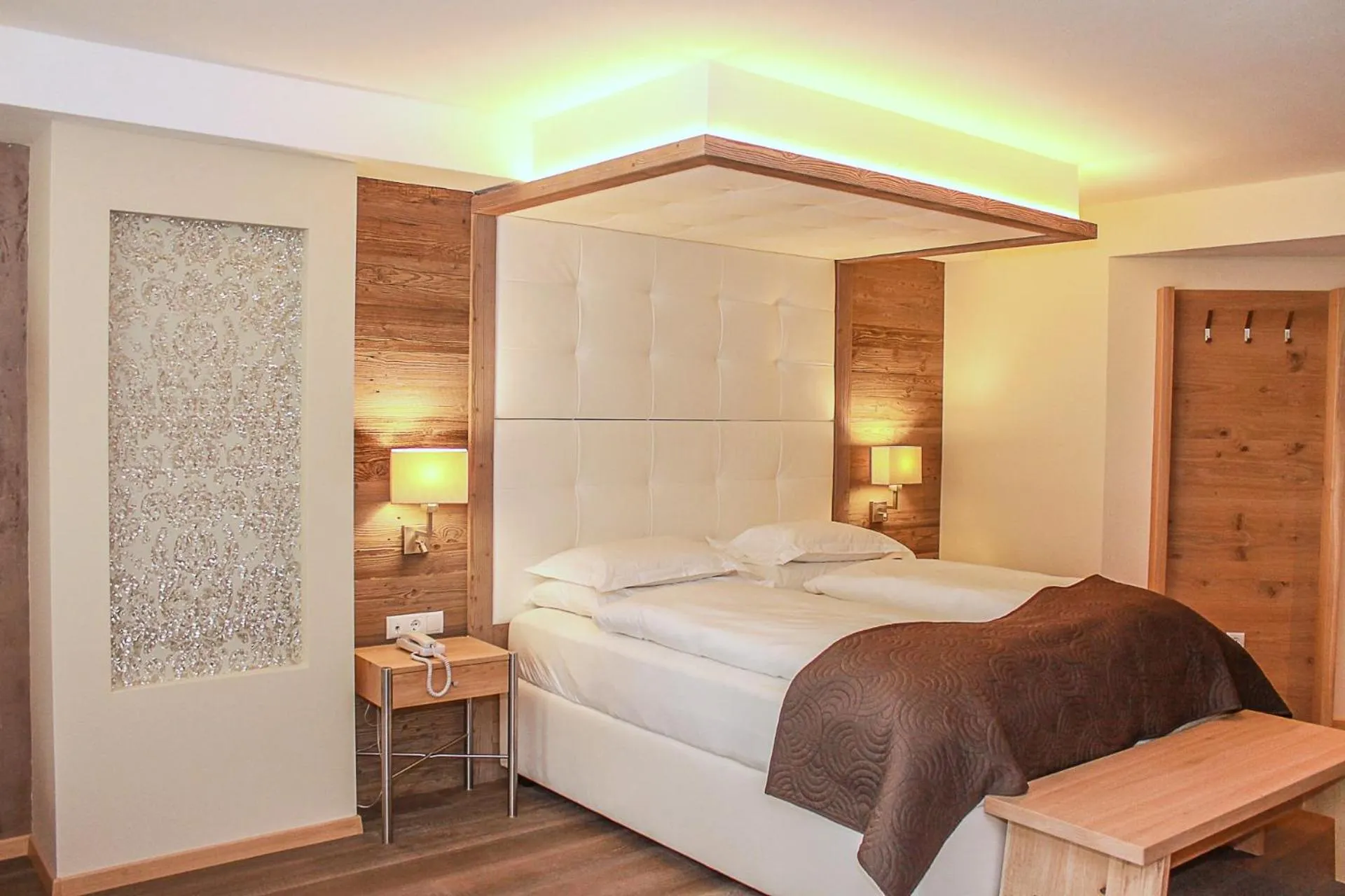 Photo of the whole room, Bed in Quellenhof Luxury Resort Passeier