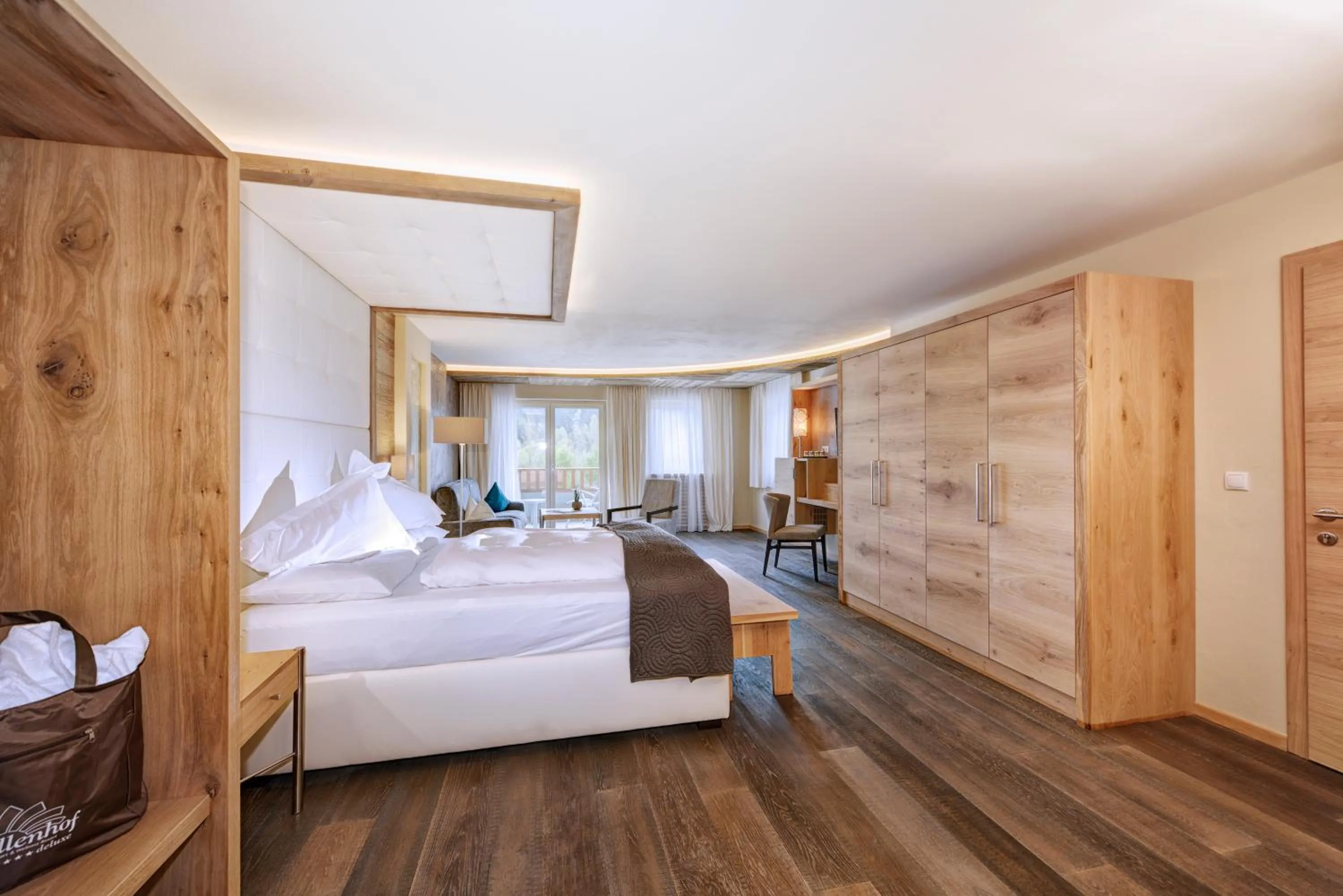 Living room, Bed in Quellenhof Luxury Resort Passeier