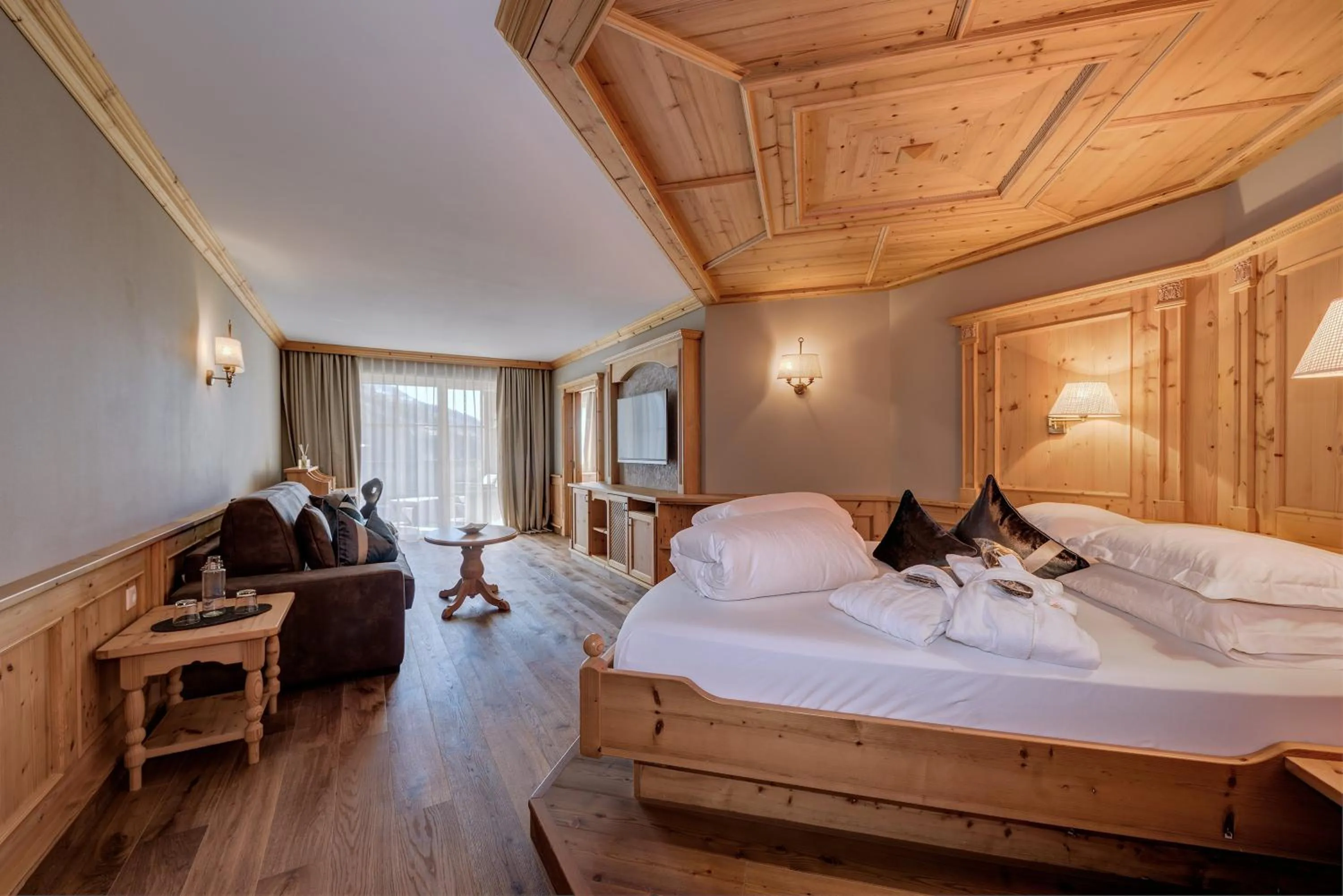 Bedroom, Bed in Quellenhof Luxury Resort Passeier