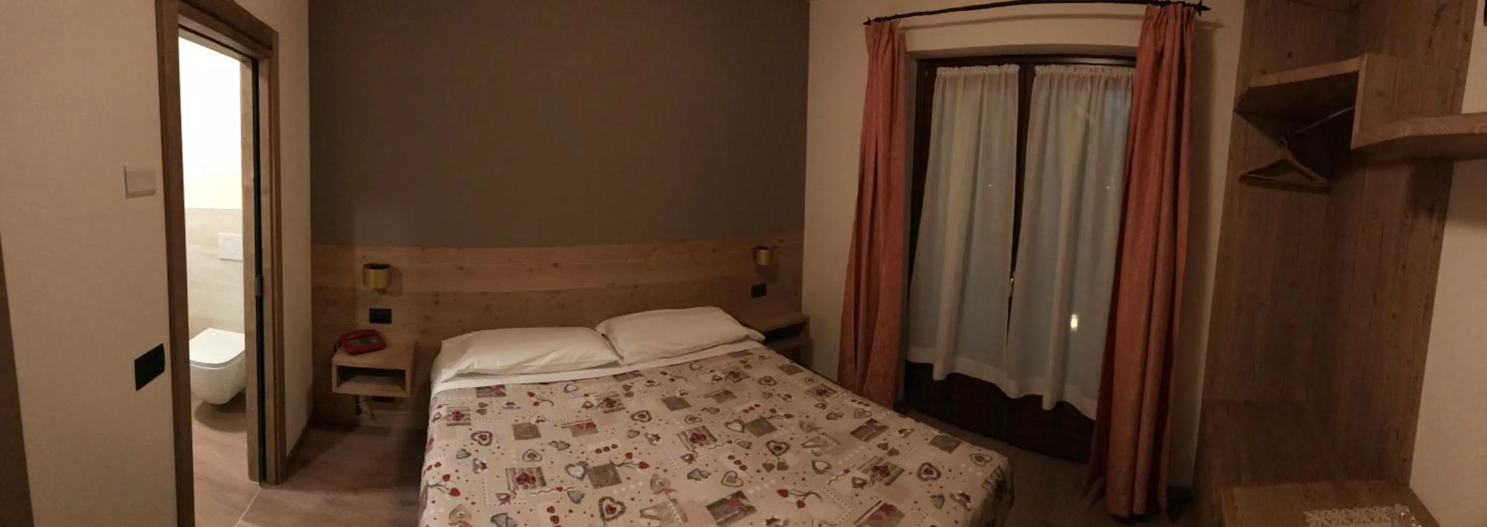 Bed in Hotel Piccolo Mondo