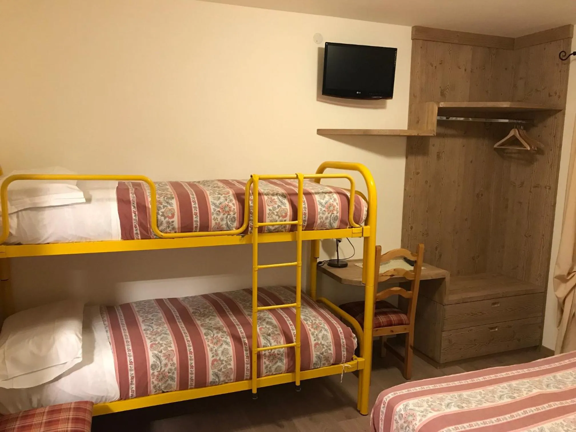 Bed in Hotel Piccolo Mondo