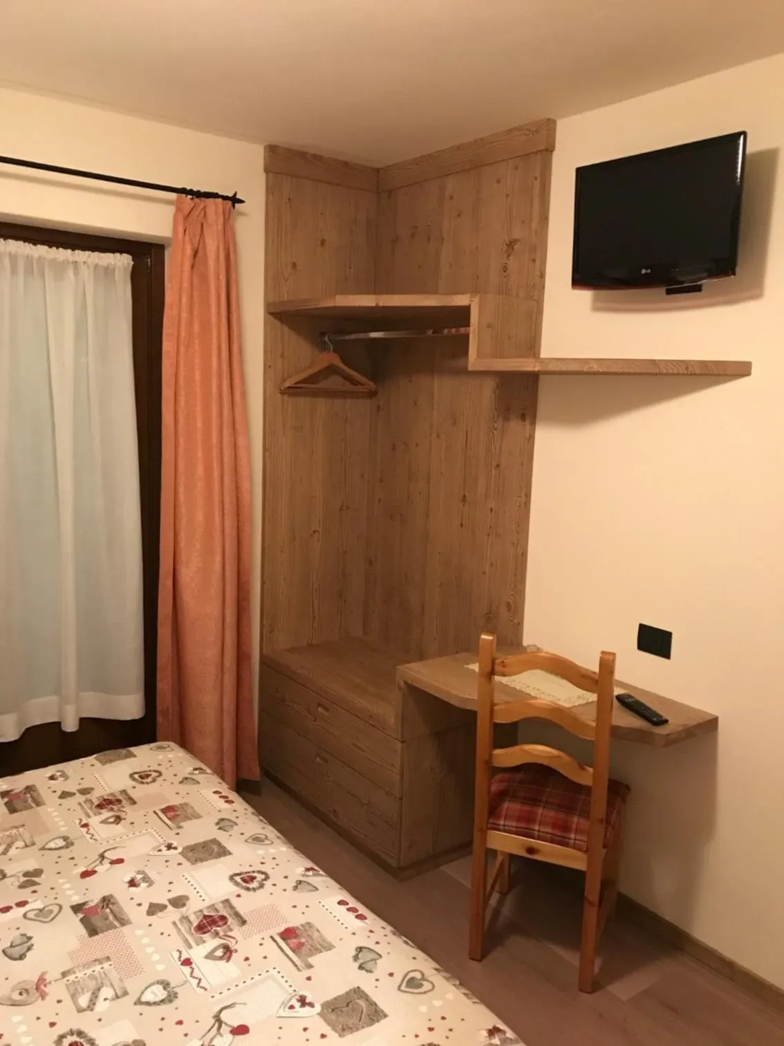 Bed in Hotel Piccolo Mondo