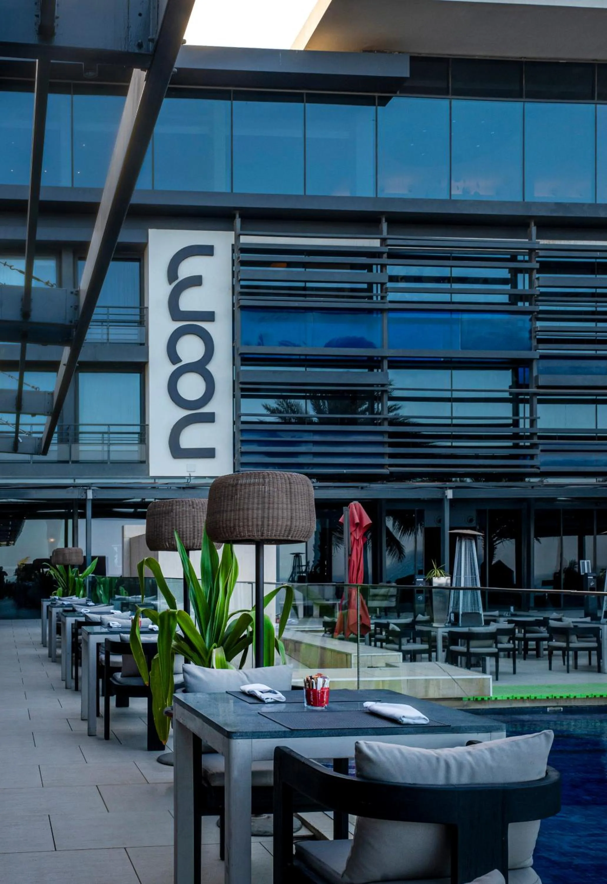 Property logo or sign in Noom Hotel Dakar Sea Plaza, a member of Radisson Individuals