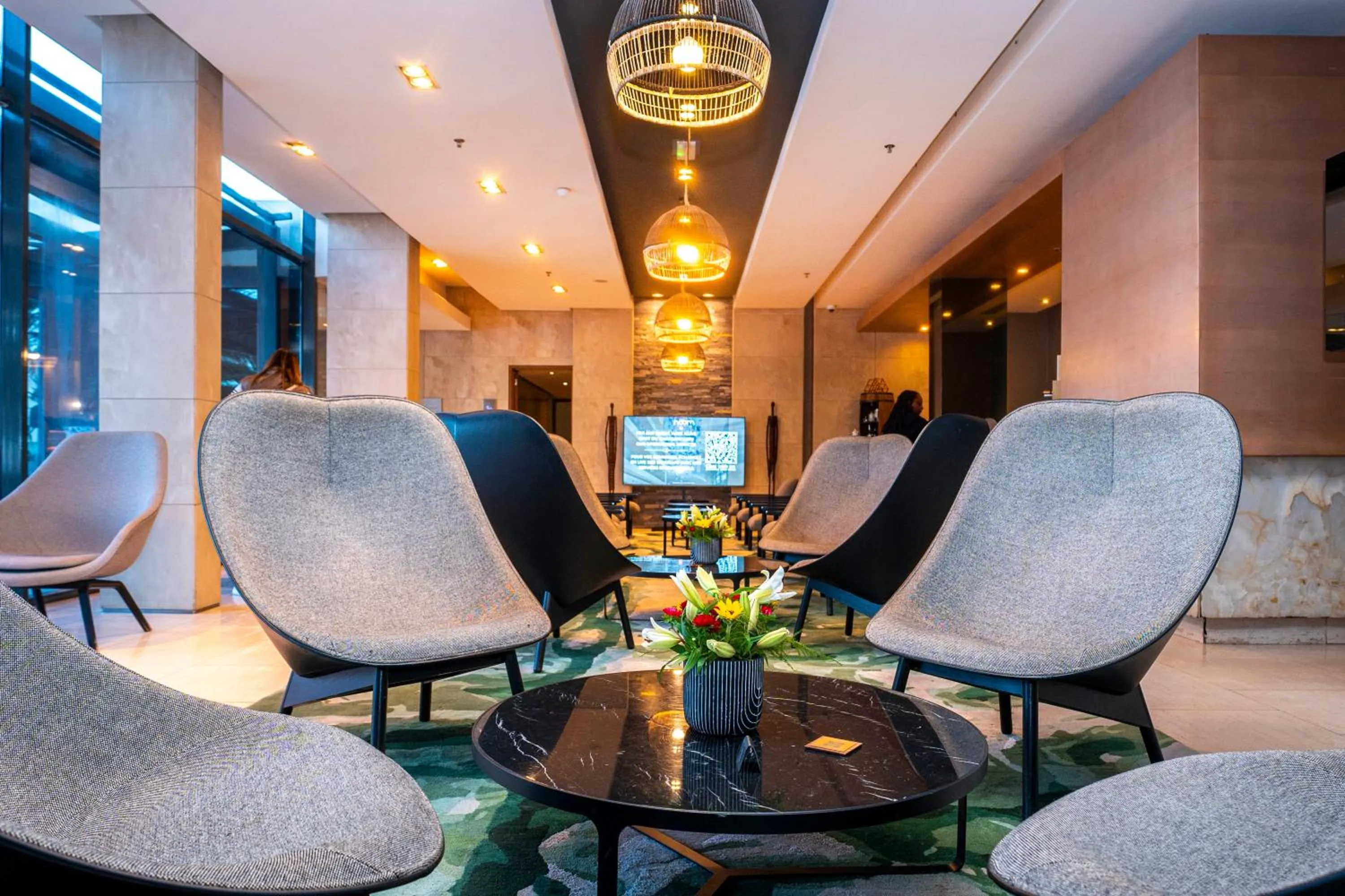 Communal lounge/ TV room in Noom Hotel Dakar Sea Plaza, a member of Radisson Individuals
