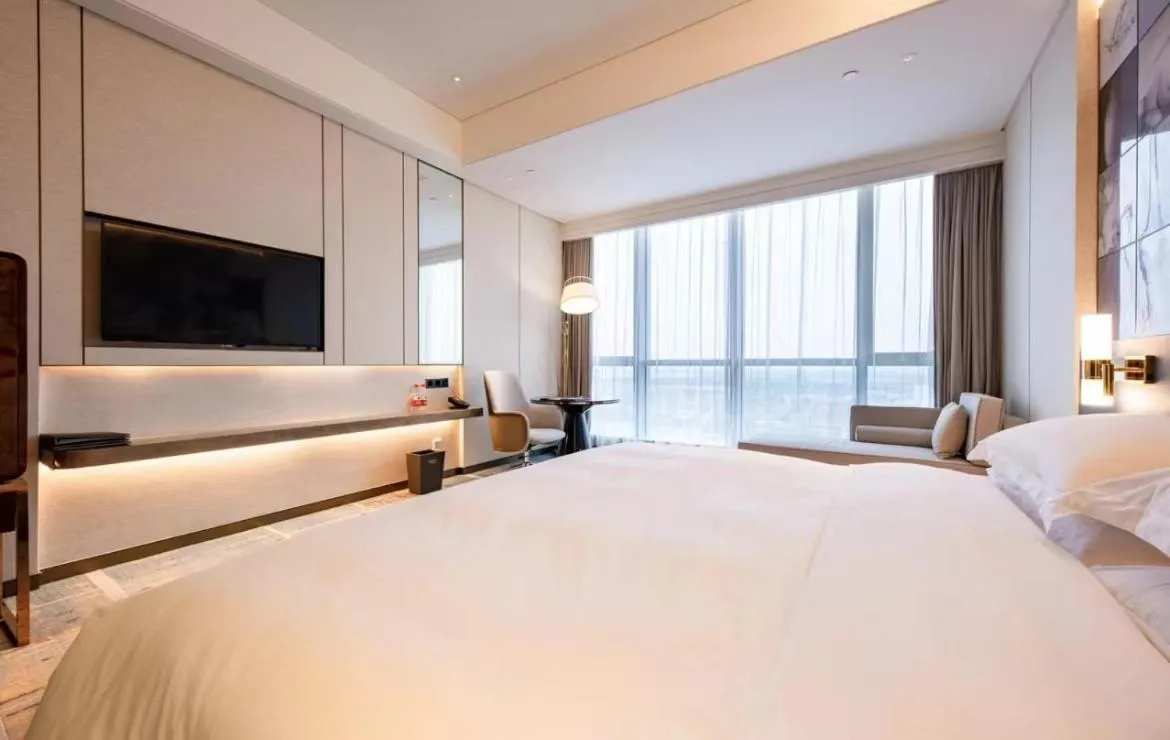 Bed in Wyndham Grand Suzhou Fenhu