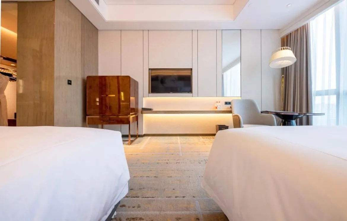 Bed in Wyndham Grand Suzhou Fenhu