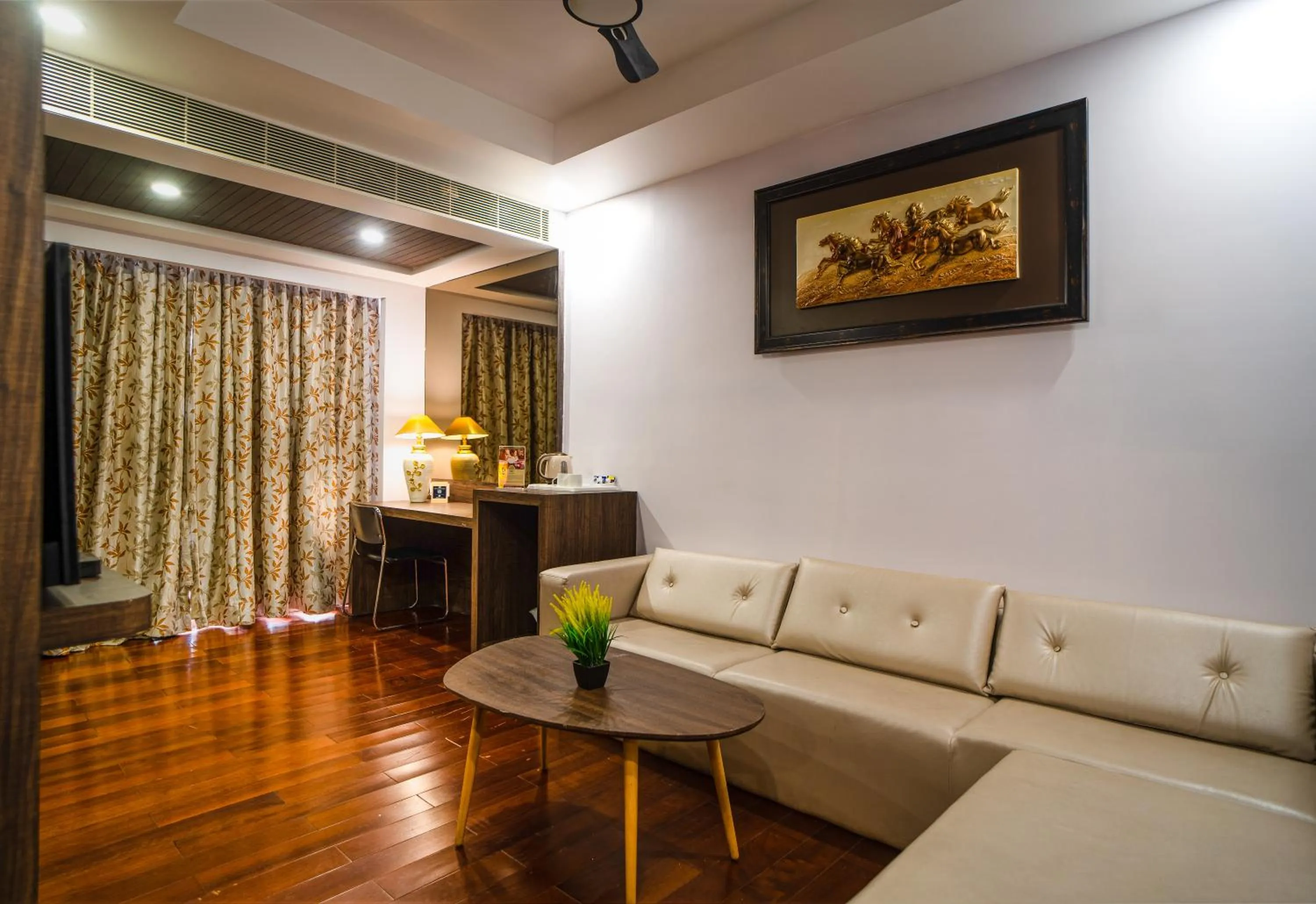 Living room in Hotel Mansha Regency