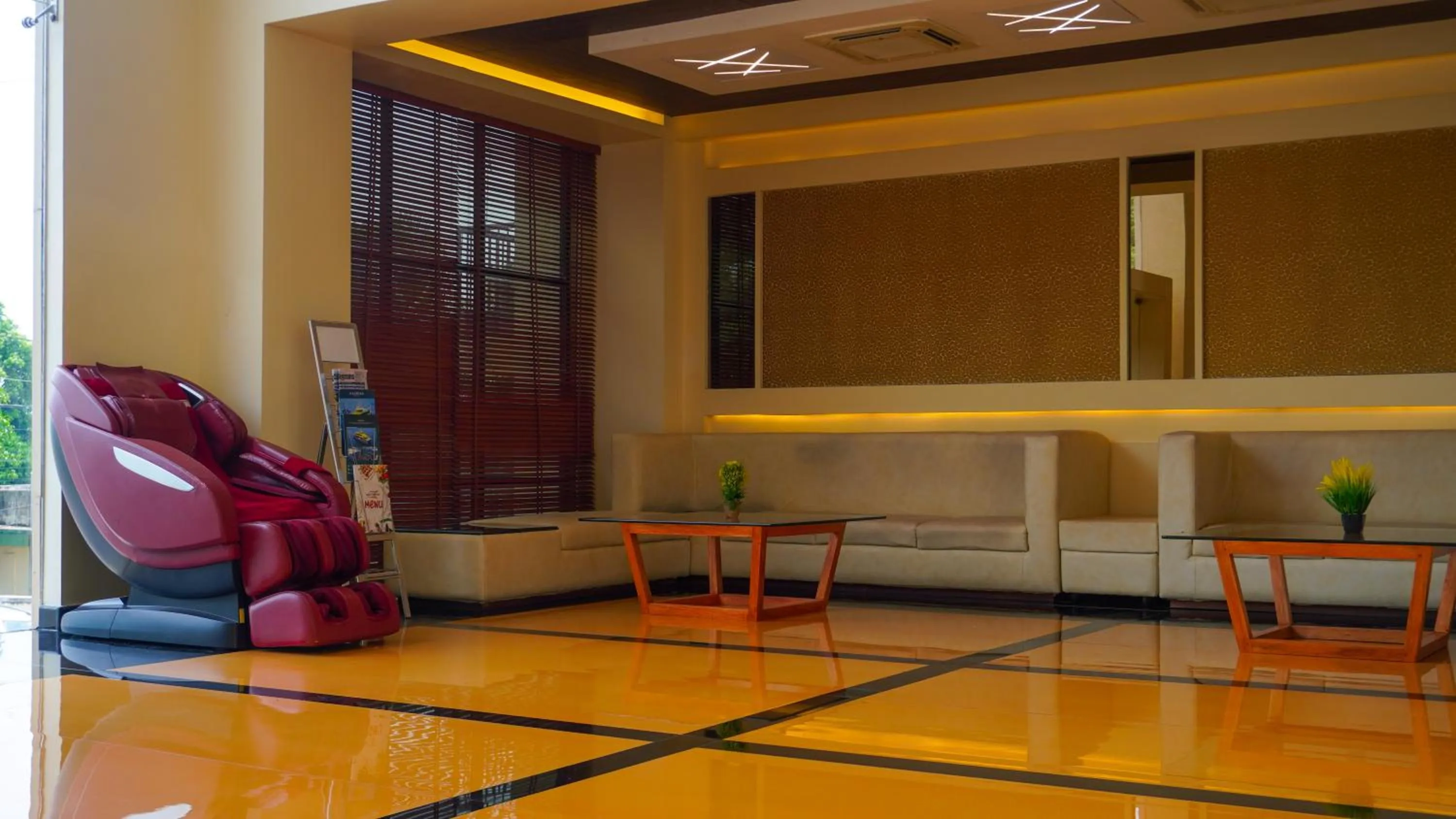 Seating area in Hotel Mansha Regency