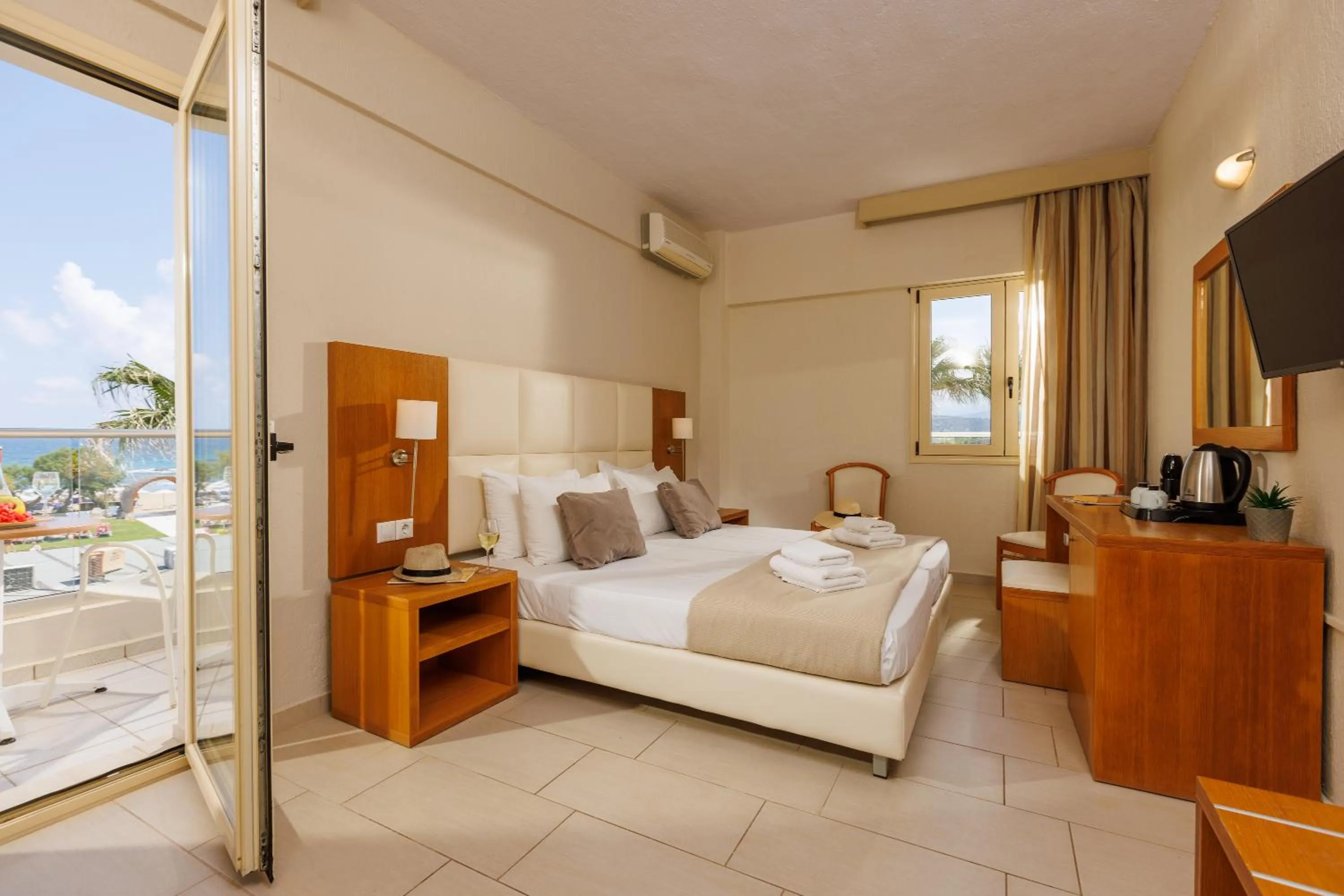 Bed in Malia Bay Beach Hotel & Bungalows