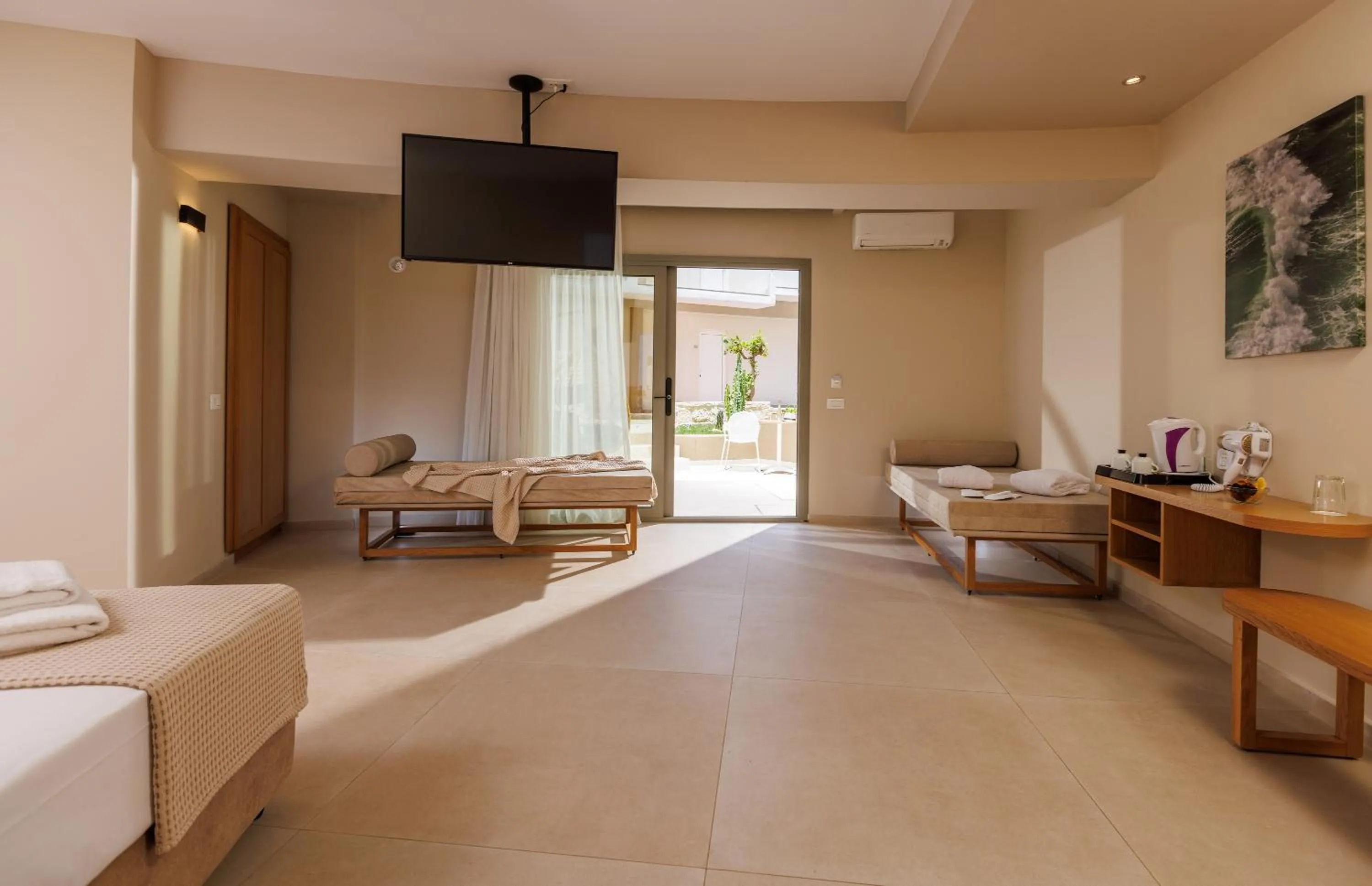 Bed in Malia Bay Beach Hotel & Bungalows