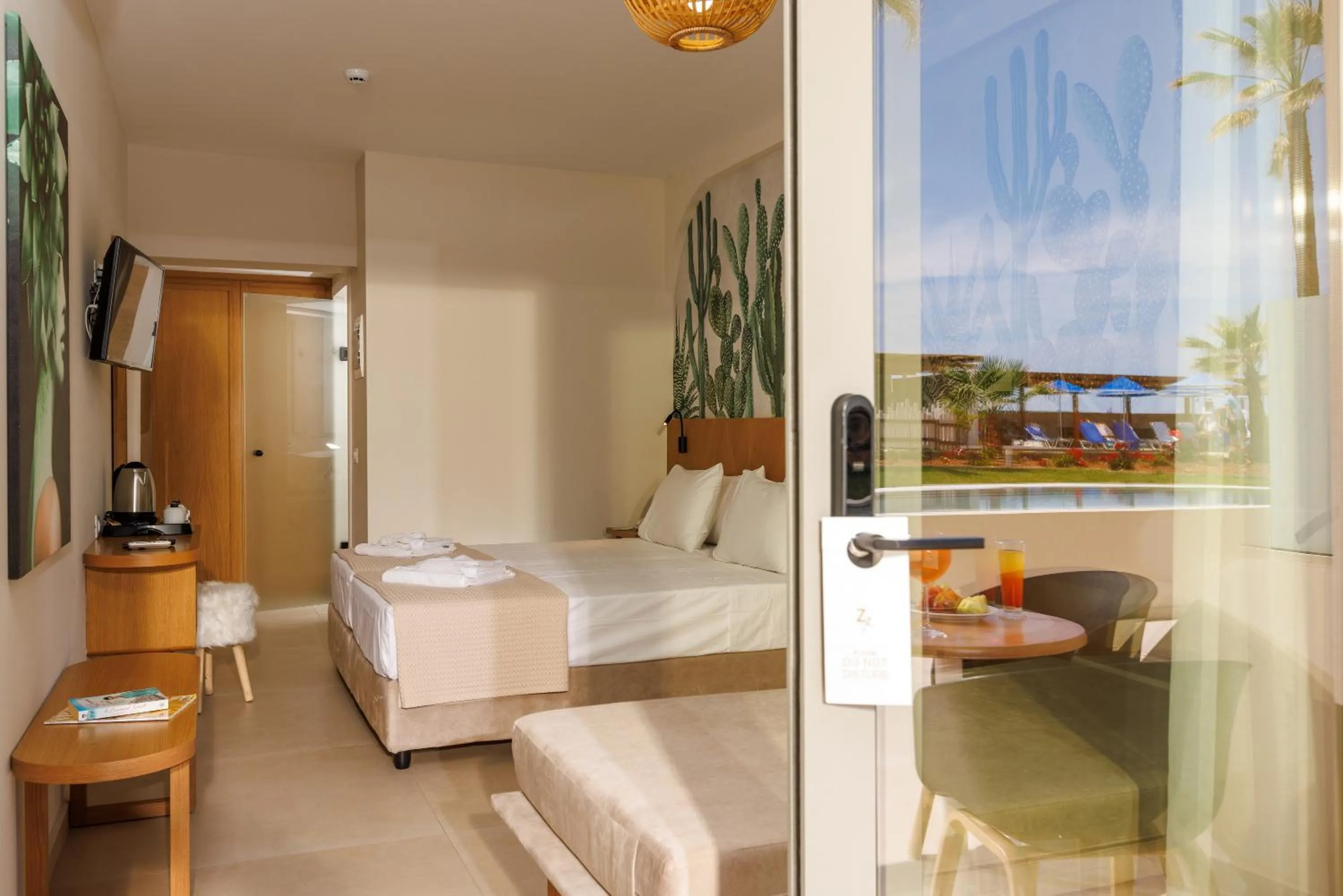 Bed in Malia Bay Beach Hotel & Bungalows