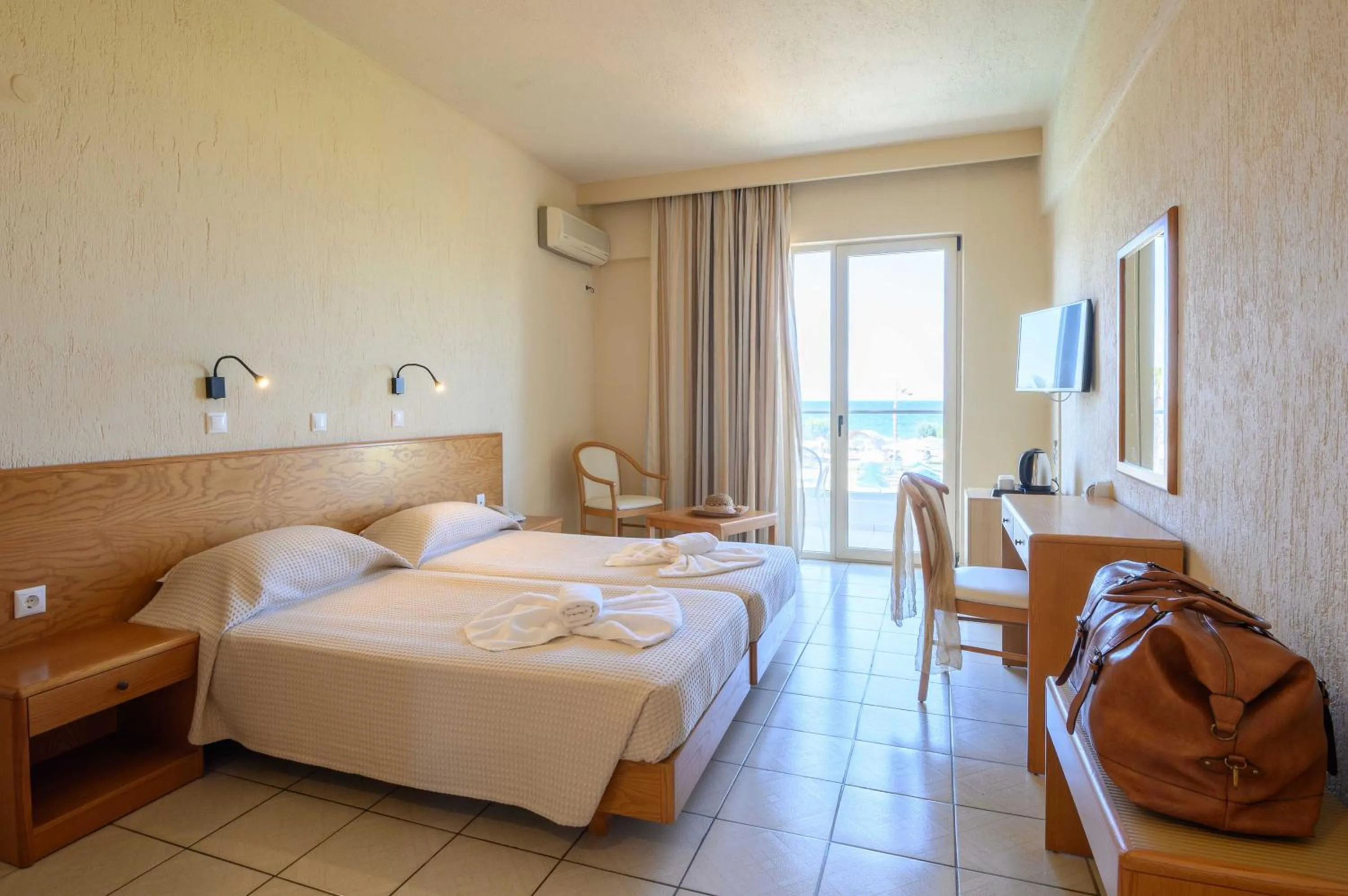 Bed in Malia Bay Beach Hotel & Bungalows