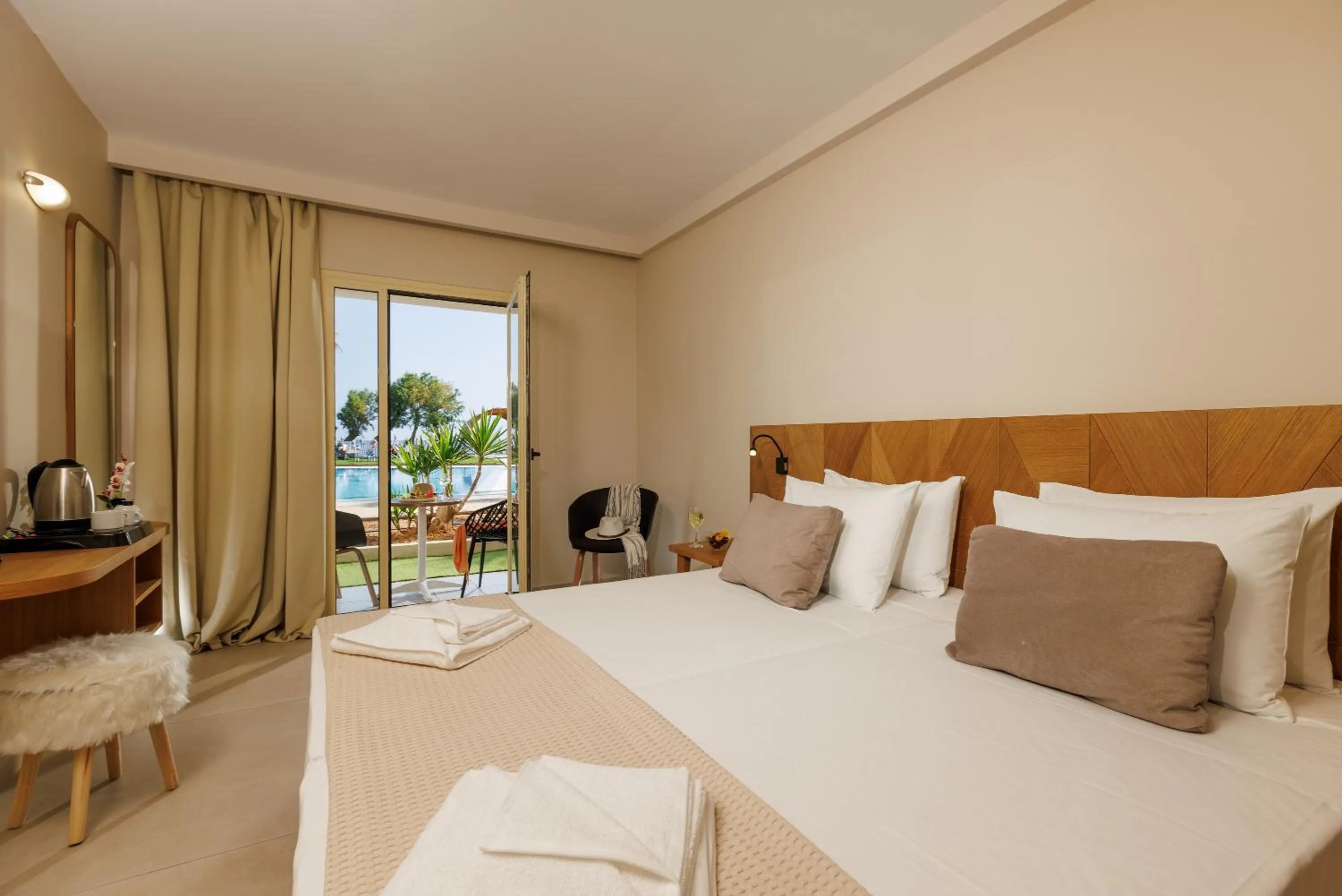 Bed in Malia Bay Beach Hotel & Bungalows