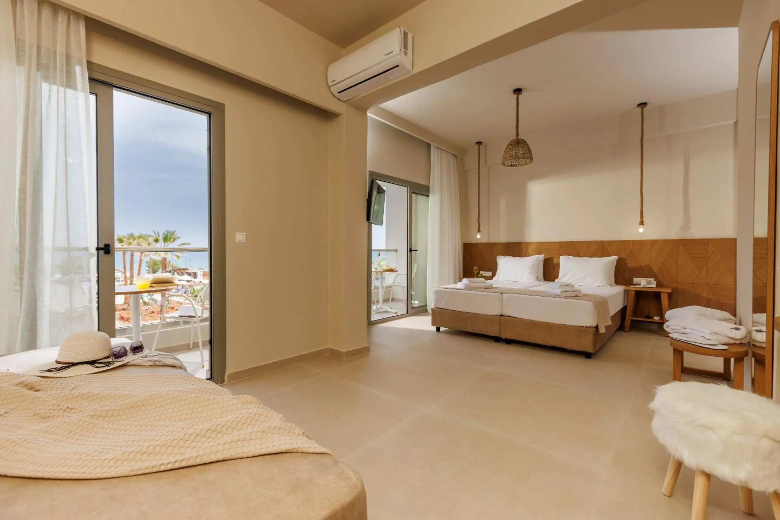 Junior Suite with Sea View in Malia Bay Beach Hotel & Bungalows Junior Suite with Sea View in Malia Bay Beach Hotel & Bungalows