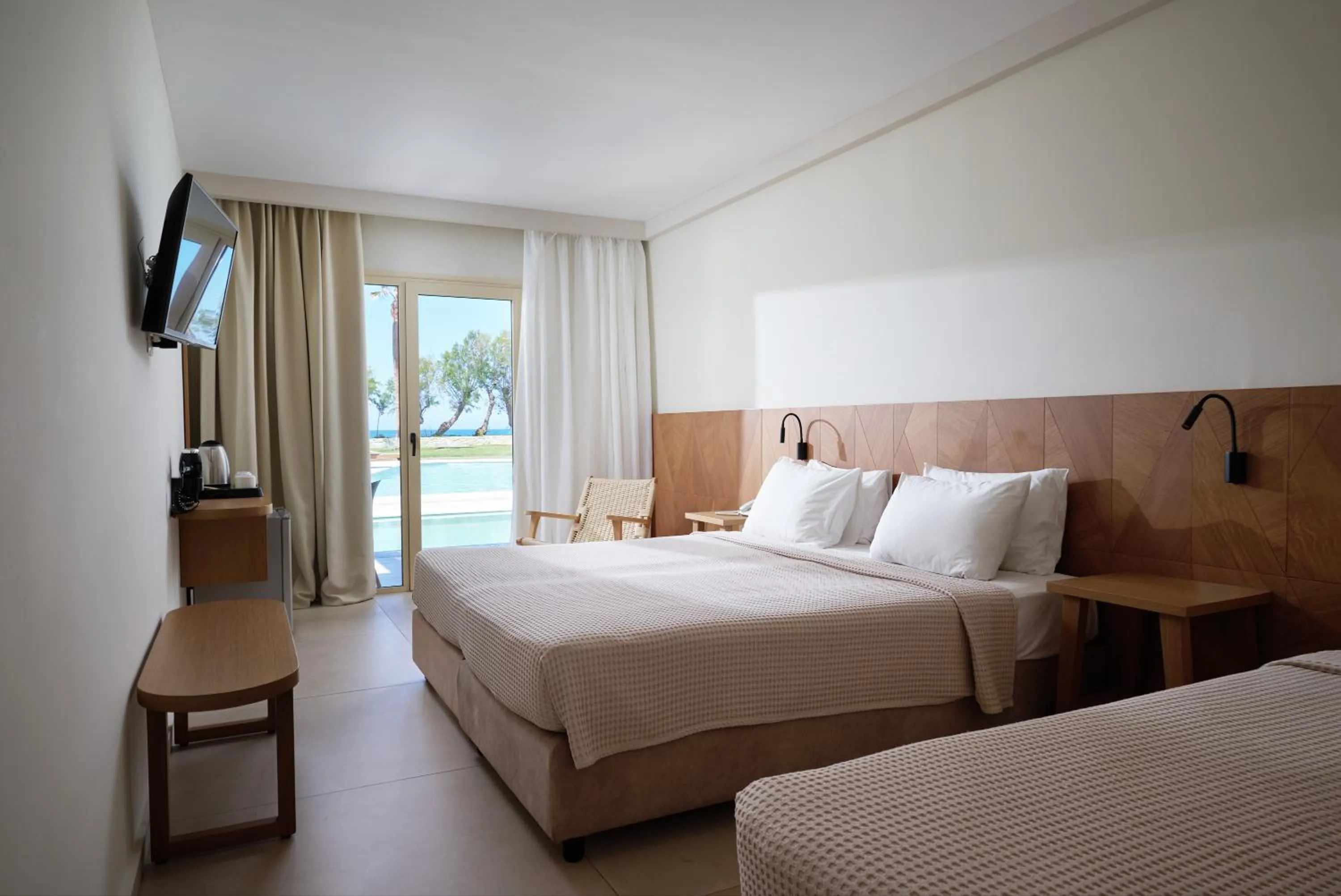 Bed in Malia Bay Beach Hotel & Bungalows