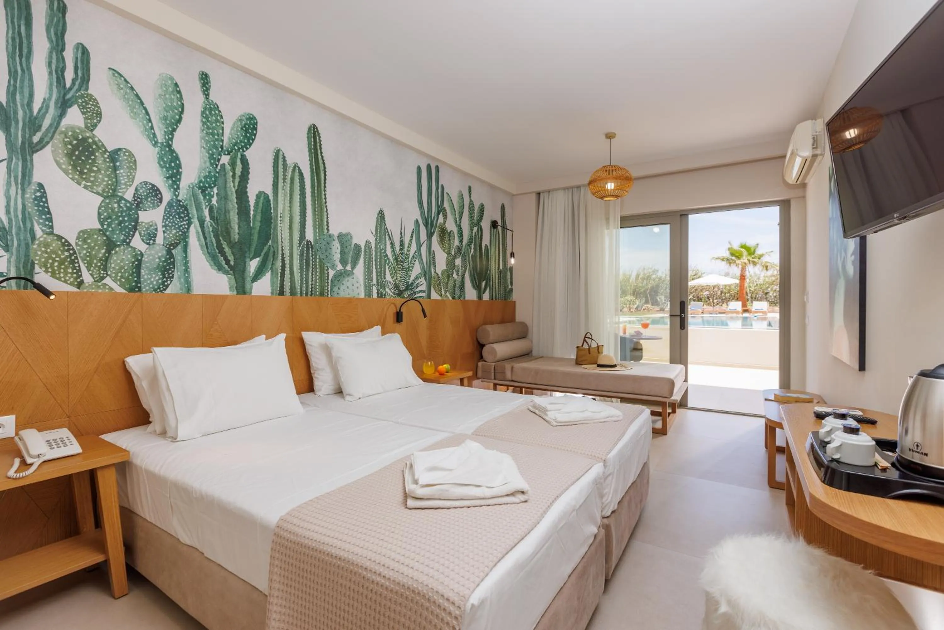 Bed in Malia Bay Beach Hotel & Bungalows
