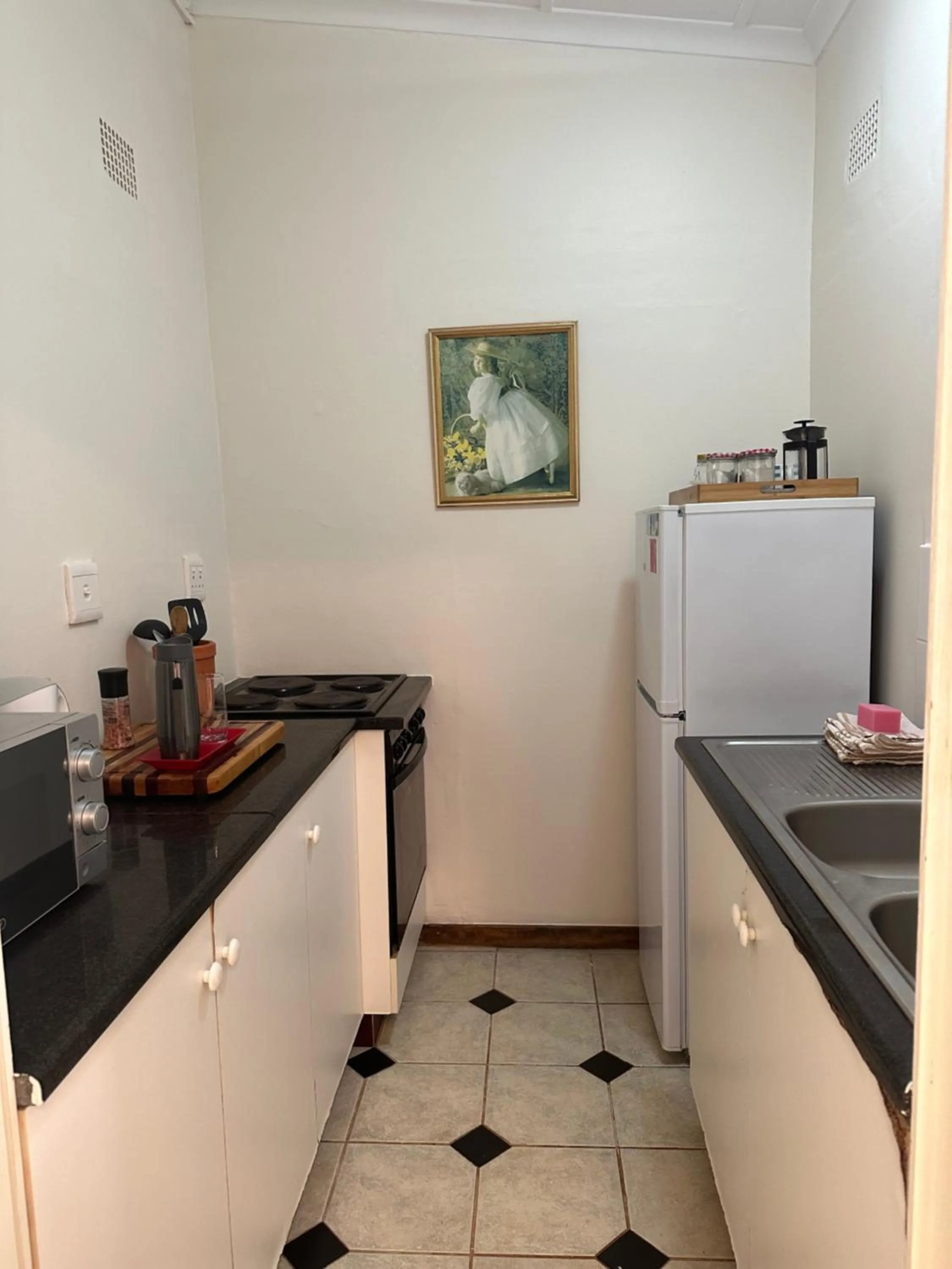 Kitchen or kitchenette in Salt Rock Manor