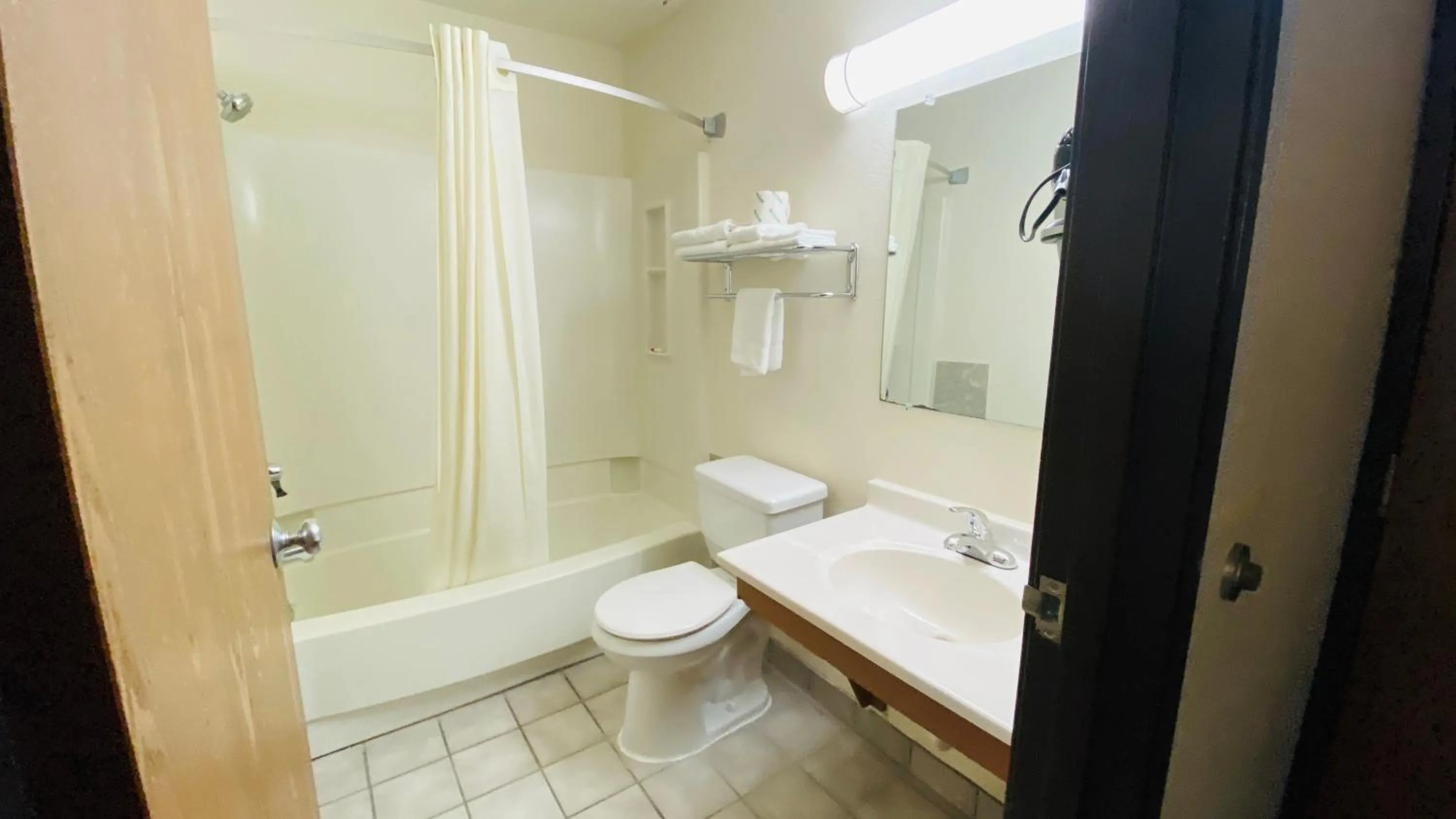 Bathroom in Super 8 by Wyndham Mokena/Frankfort /I-80